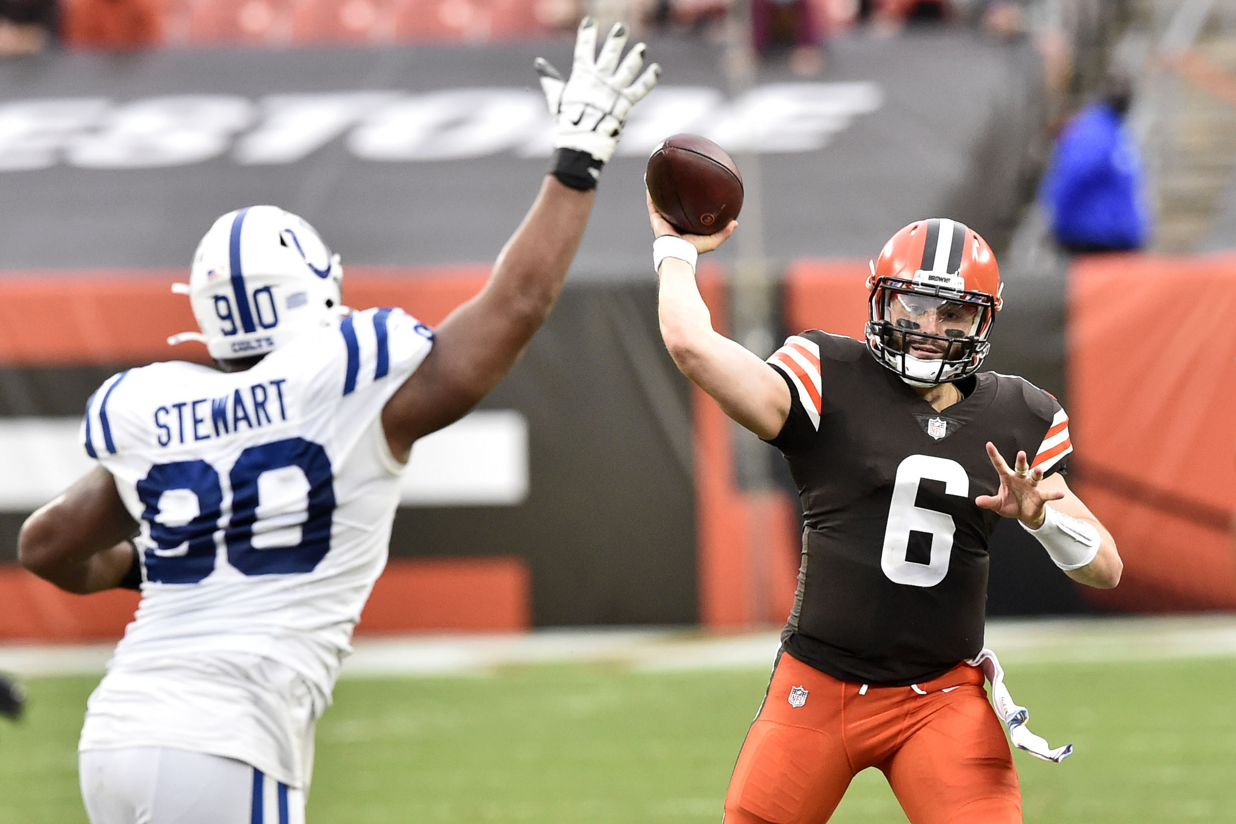 Cleveland Browns safety Sheldrick Redwine, left, celebrates with teammates  after an interception during the second half of an NFL football game  against the Indianapolis Colts, Sunday, Oct. 11, 2020, in Cleveland. The