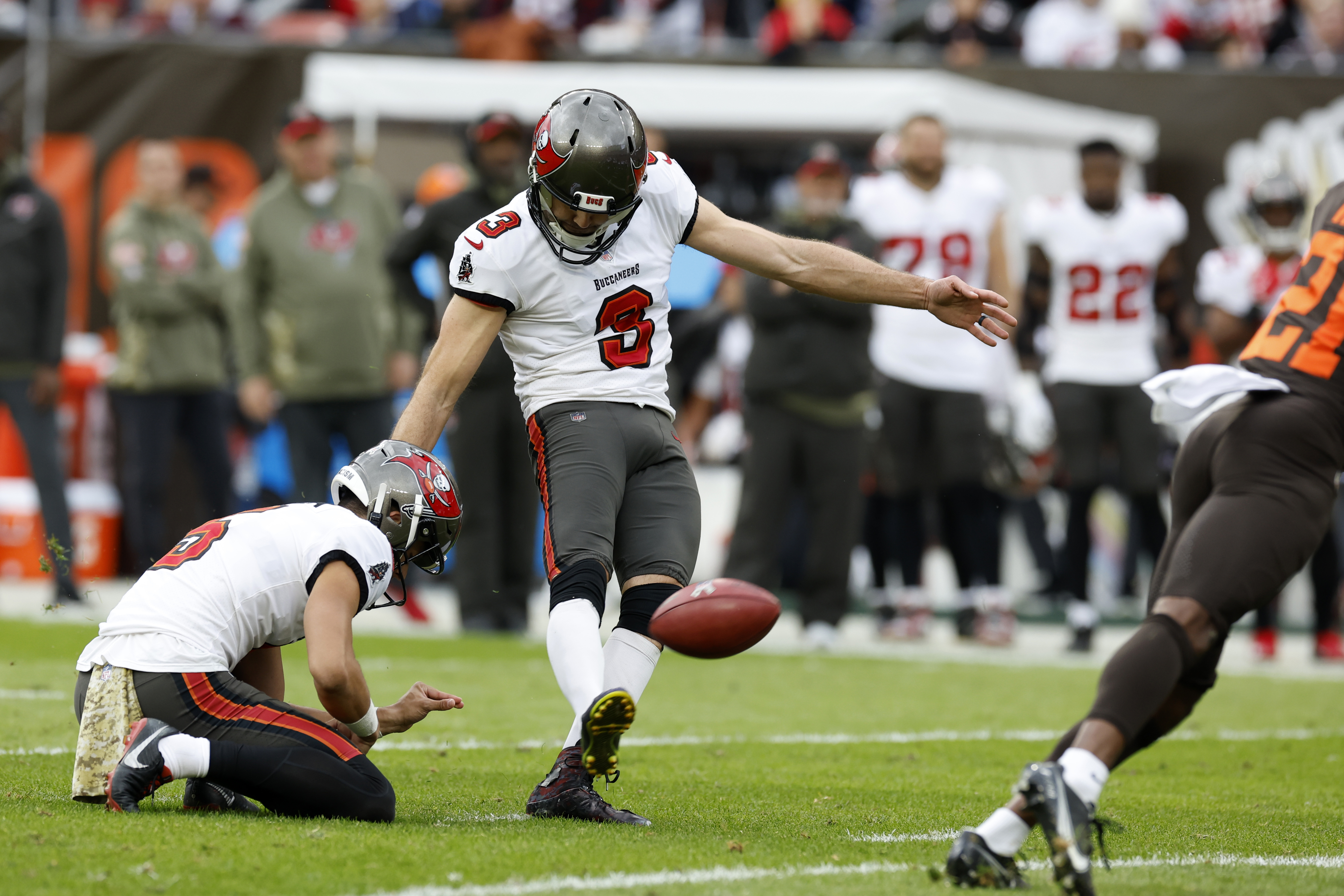 Cleveland Browns running back Nick Chubb, right, scores a touchdown in  overtime of the team's NFL football game against the Tampa Bay Buccaneers  in Cleveland, Sunday, Nov. 27, 2022. The Browns won