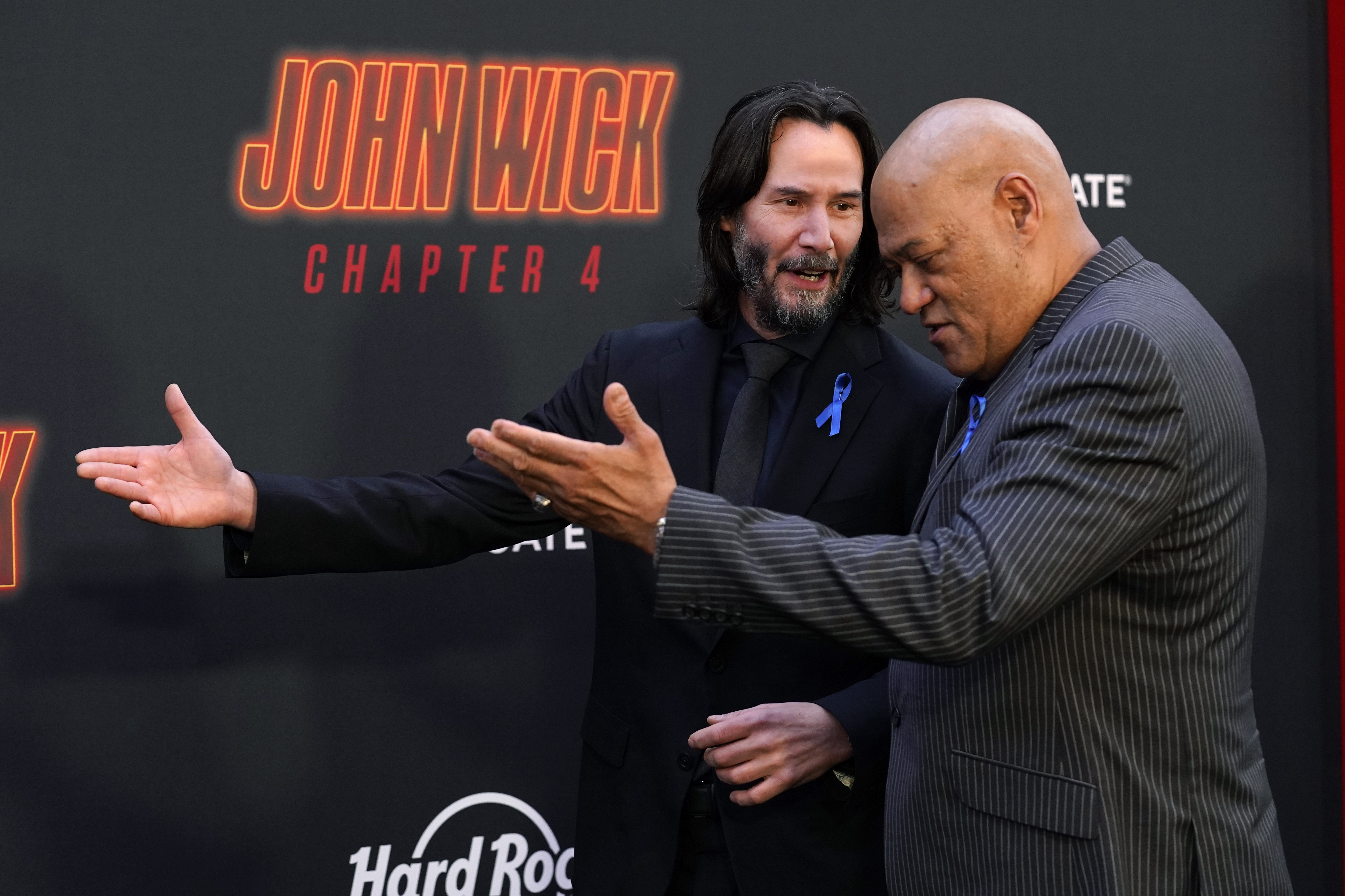 Keanu Reeves Pays Tribute to Lance Reddick at “John Wick 4” Premiere – Robb  Report