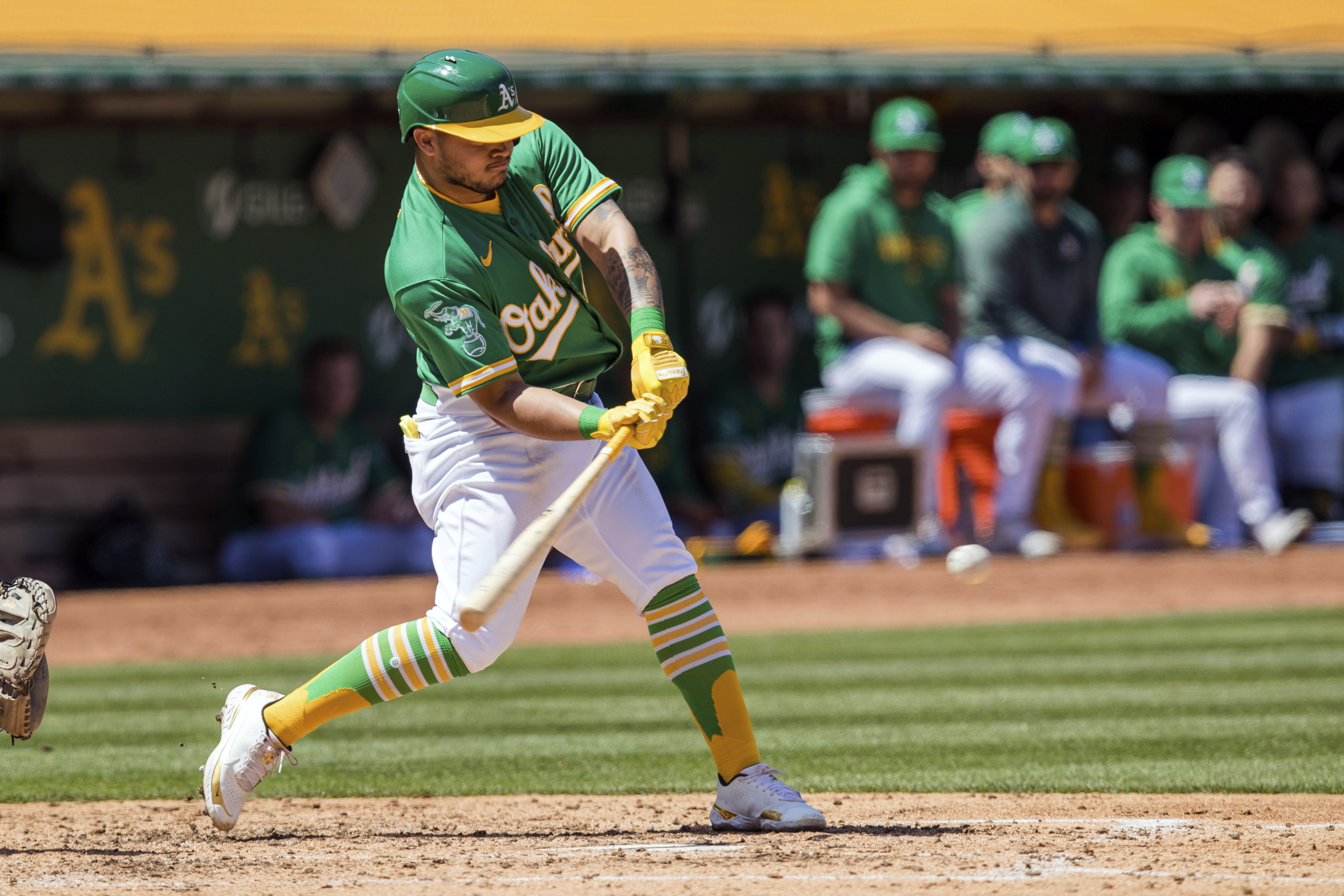 Oakland Athletics' Ramon Laureano, left, is tagged out by Houston