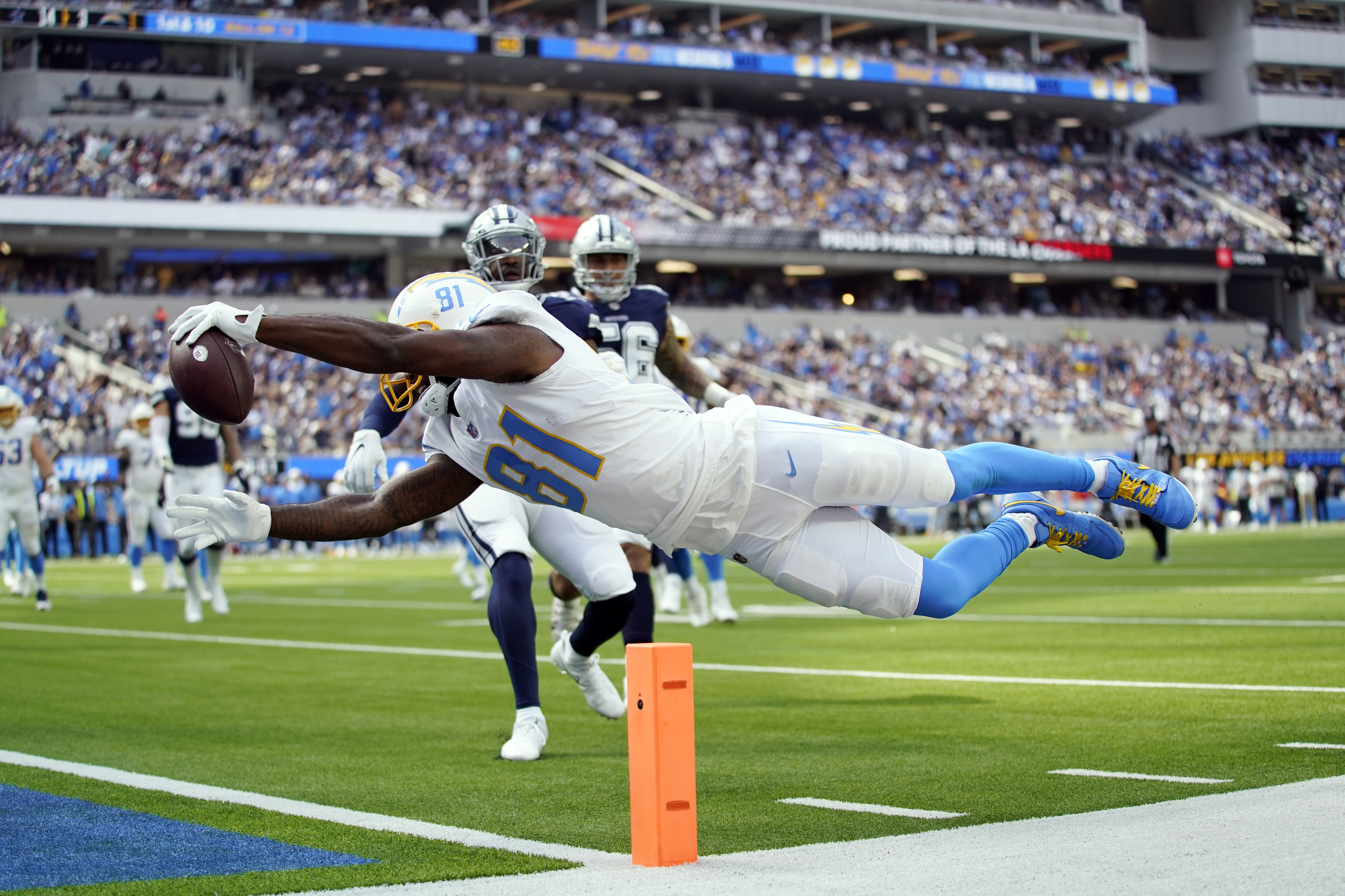 September 19, 2021 Dallas Cowboys running back Tony Pollard (20) carries  the ball as Los Angeles Chargers strong safety Derwin James (33) defends  during the NFL football game between the Los Angeles