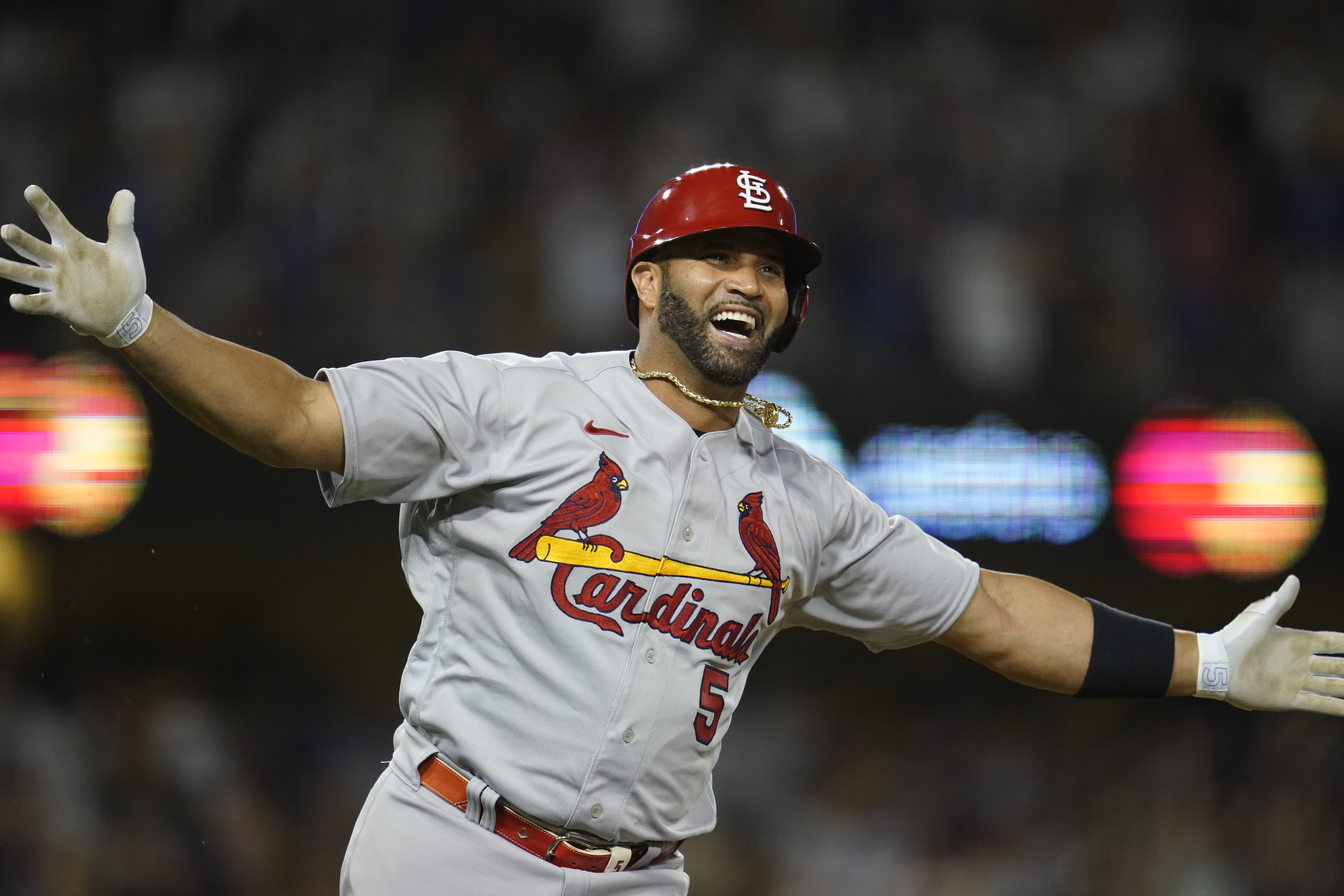Pujols hits club-record 4th slam in Cards' win