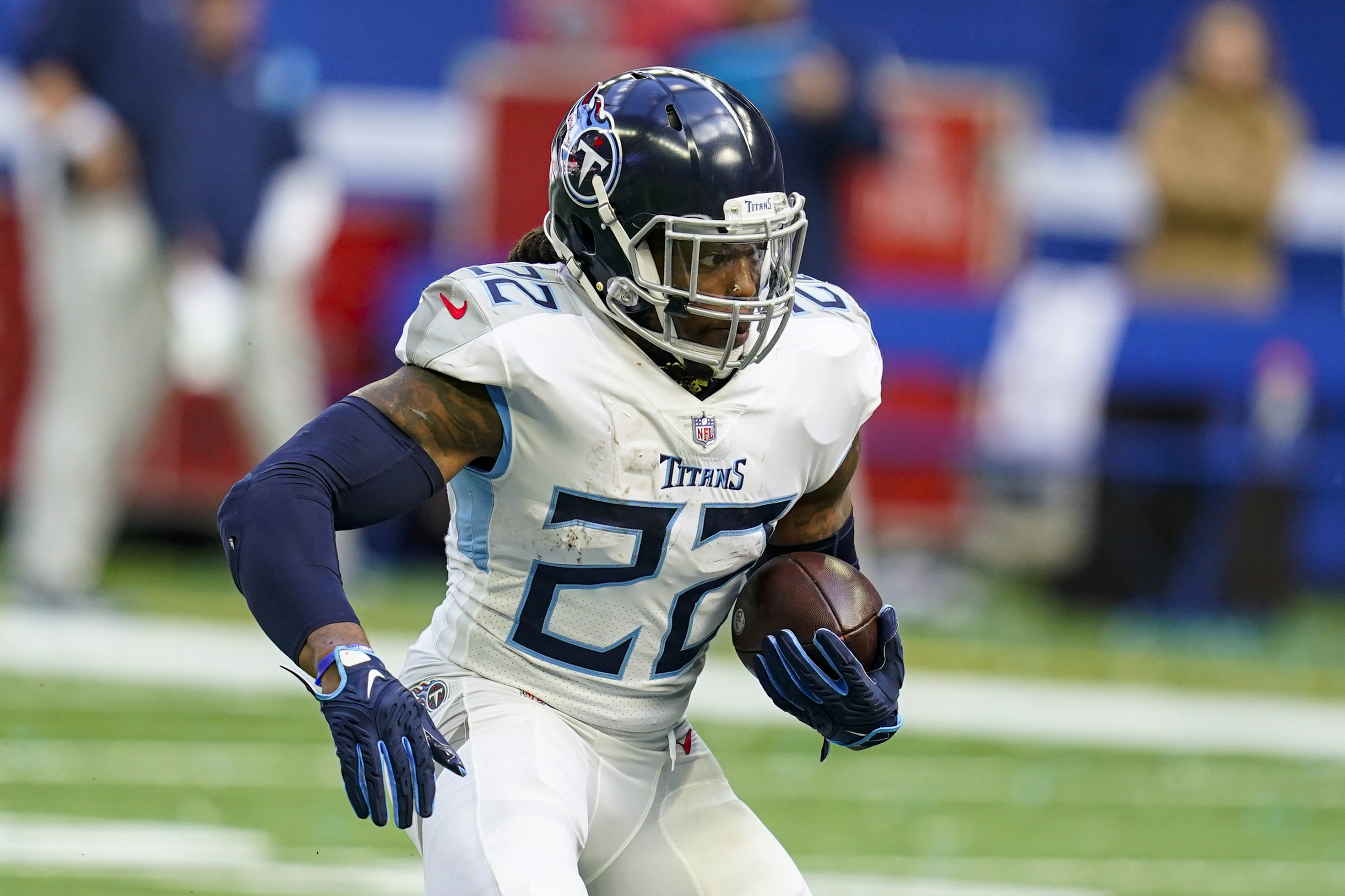 Tennessee Titans running back Derrick Henry (22) carries the ball against  the Las Vegas Raiders in the first half of an NFL football game Sunday,  Sept. 25, 2022, in Nashville, Tenn. (AP