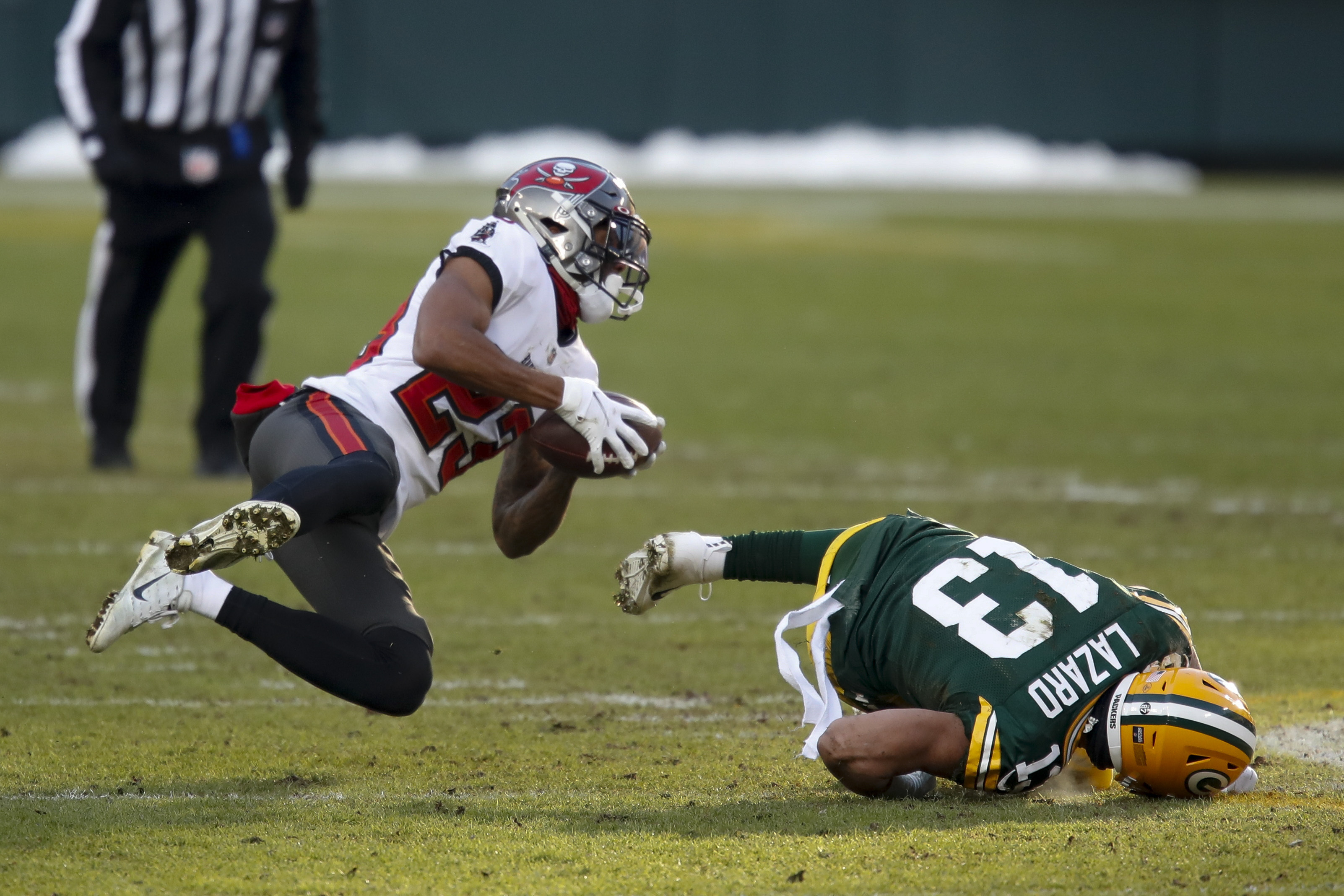 Packers' season over after 31-26 loss to Tampa Bay; Rodgers 'gutted'