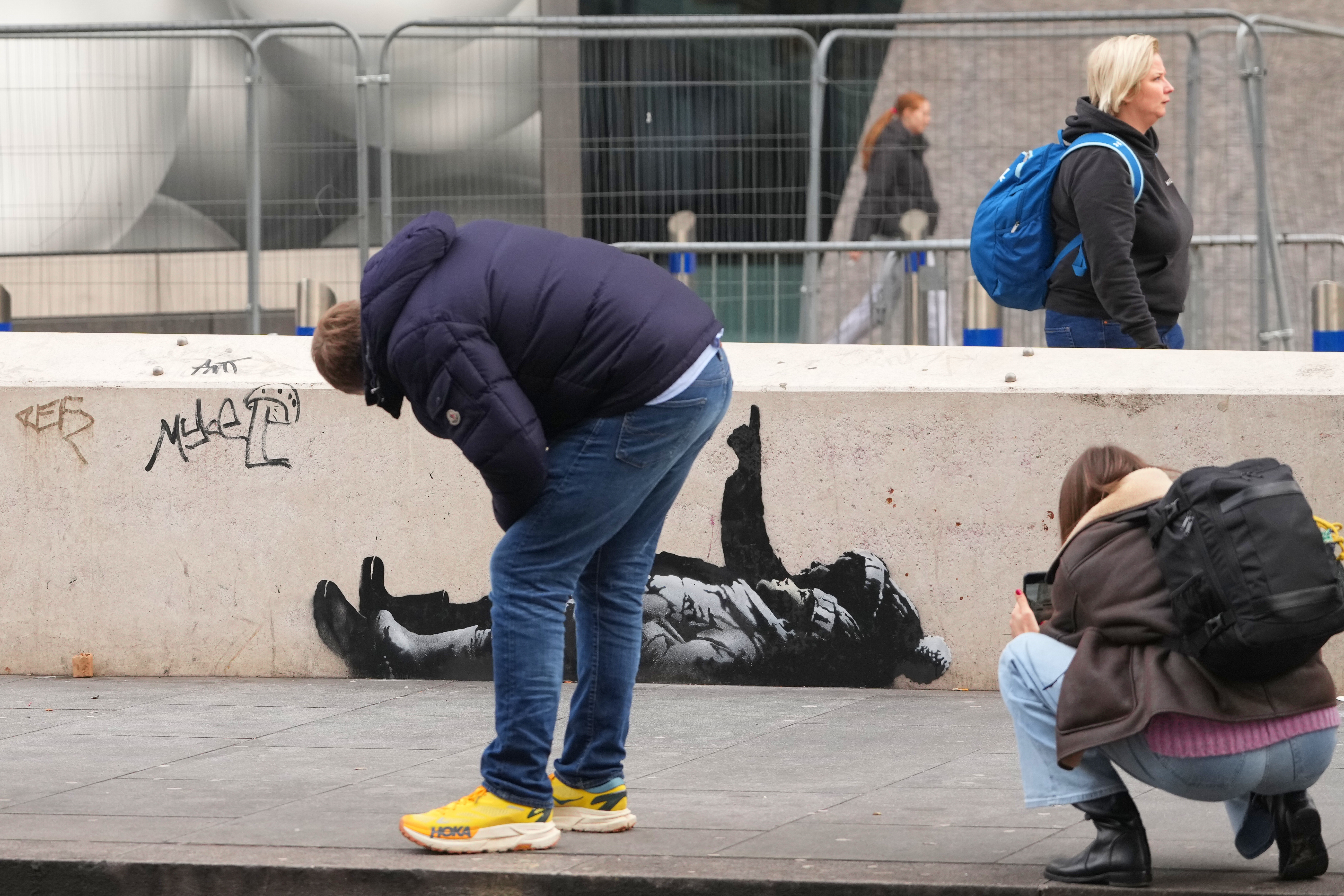 Banksy unveils new art in London following speculation over murals
