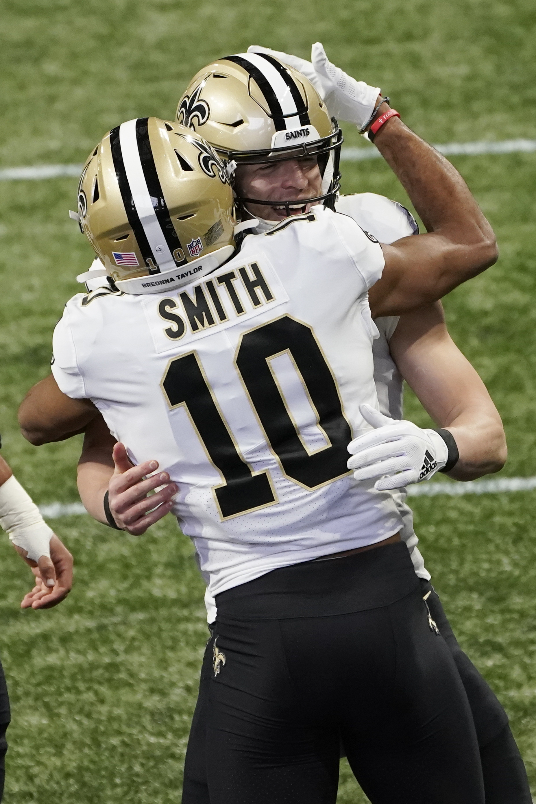 Hill throws 2 TD passes, Saints hold off Falcons 21-16 - The San