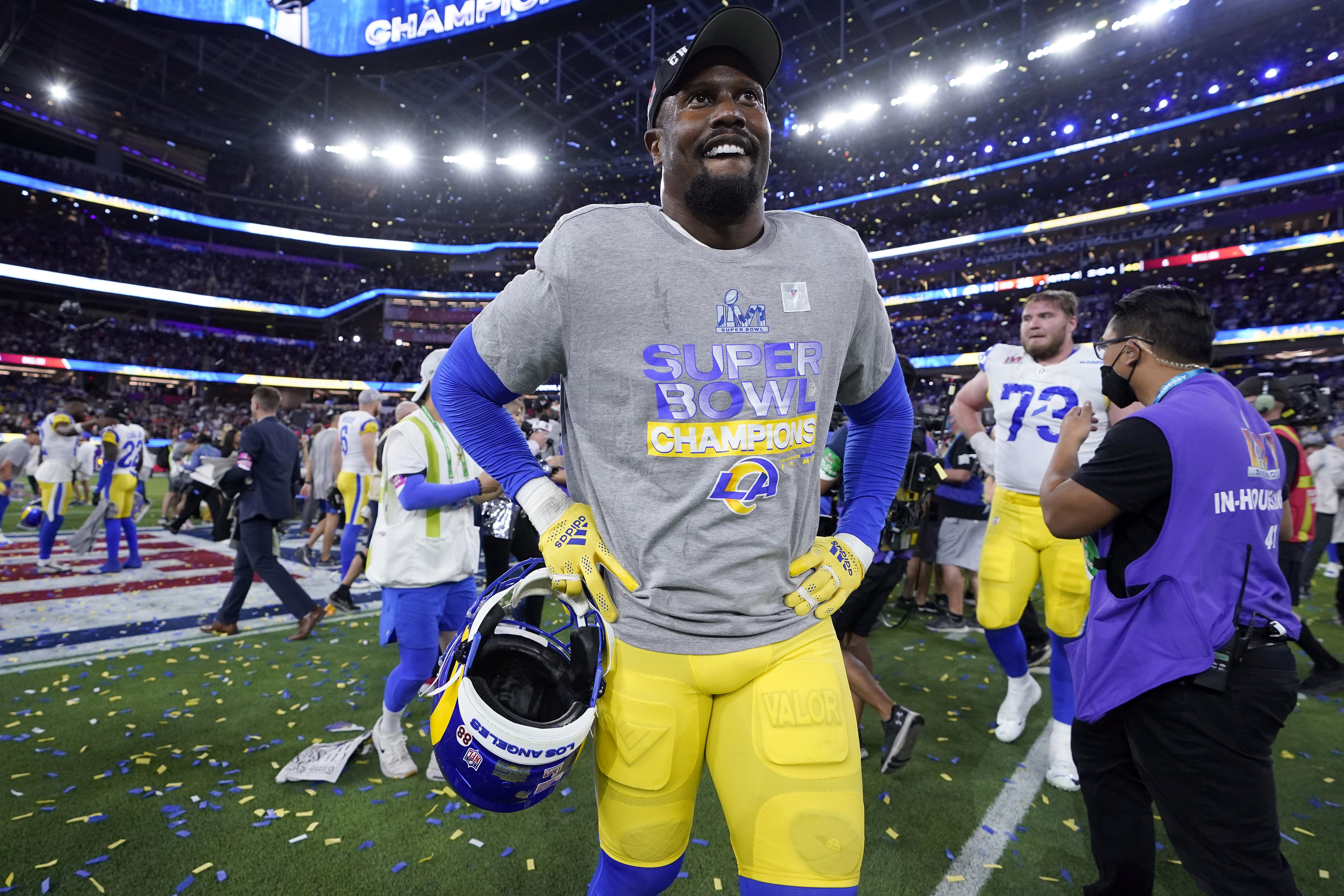 Los Angeles Rams outside linebacker Von Miller lifts the the Lombardi Trophy  after the Rams def …