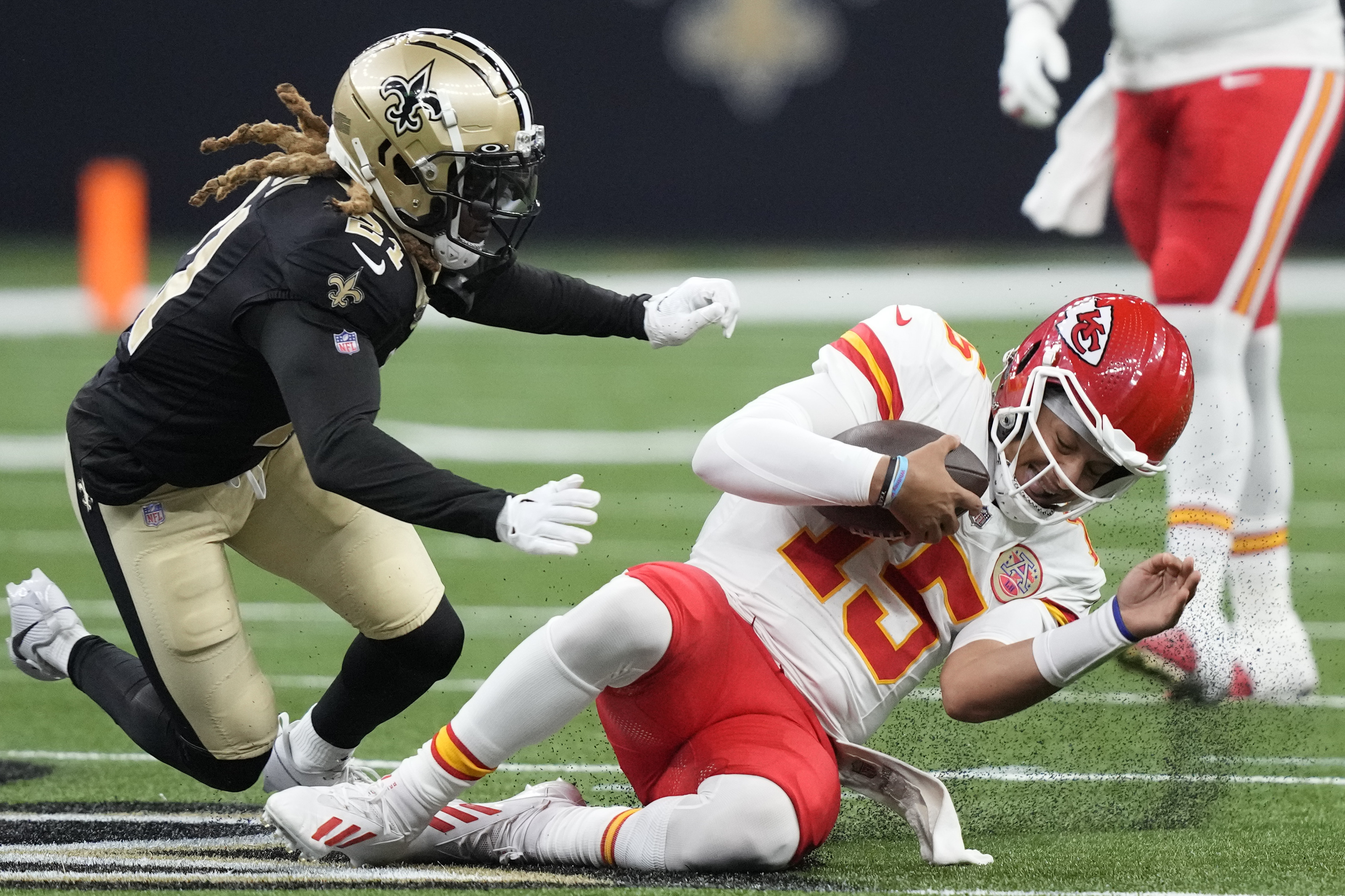 Kansas City Chiefs quarterback Patrick Mahomes (15) looks to throw against  the Arizona Cardinals during the first half of an NFL pre-season football  game, Saturday, Aug. 21, 2023, in Glendale, Ariz. (AP