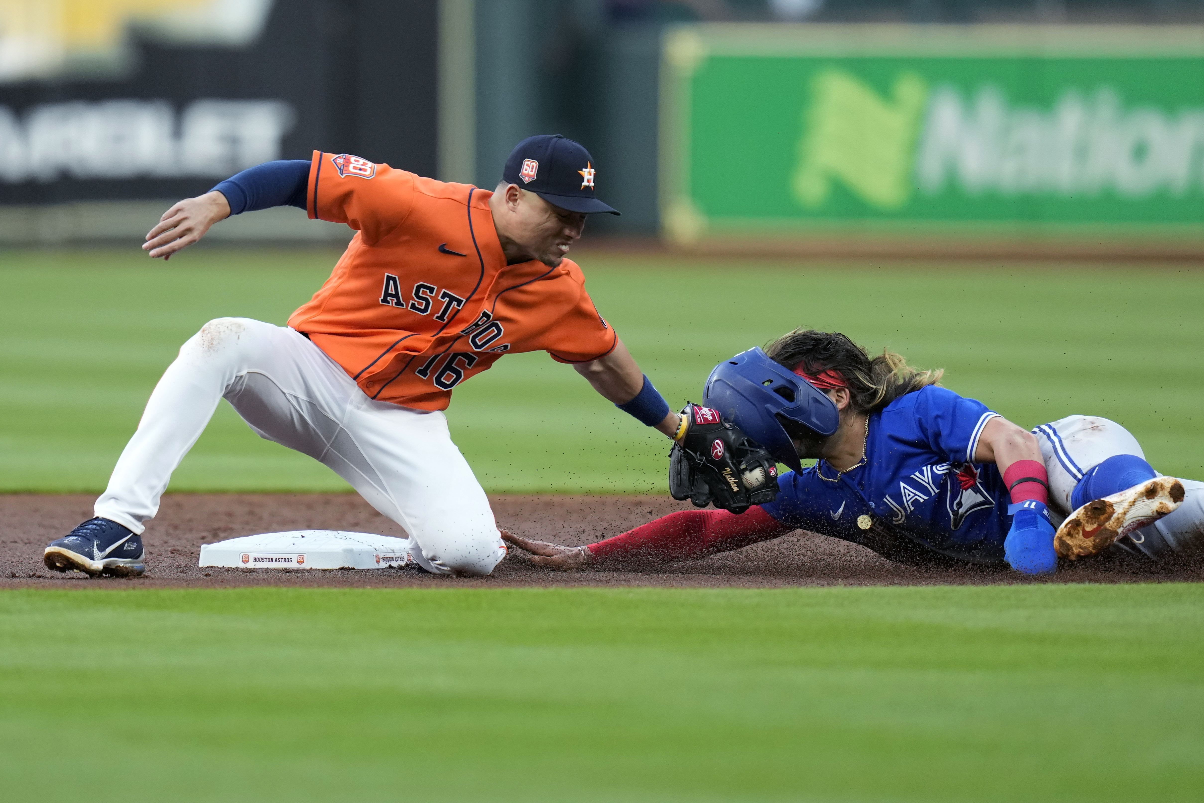 George Springer of the Houston Astros steals second base in the