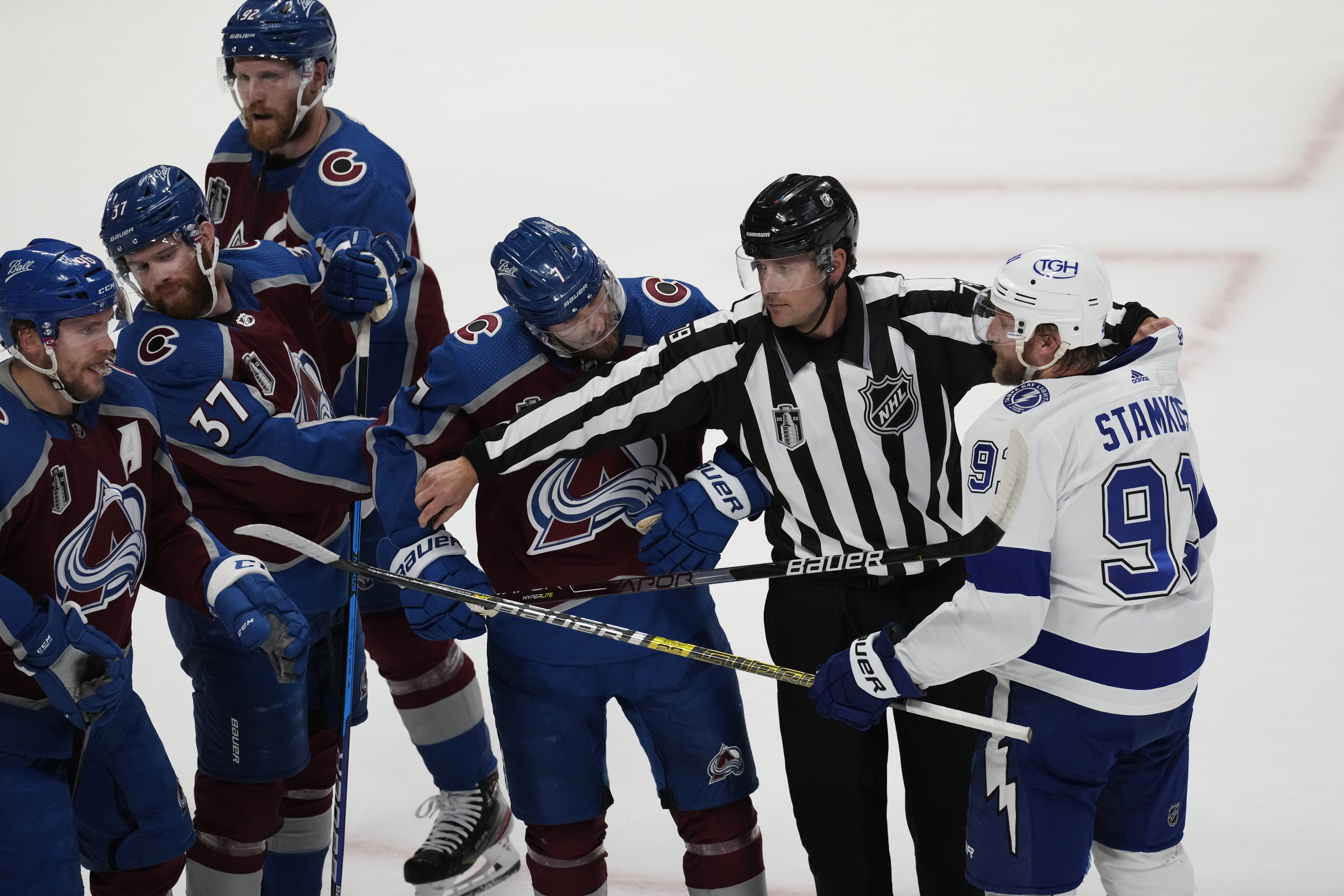 People consider merchandise while shopping at the team store Ball Arena,  Monday, June 27, 2022, in Denver after the Colorado Avalanche defeated the Tampa  Bay Lightning in Game 6 of the Stanley