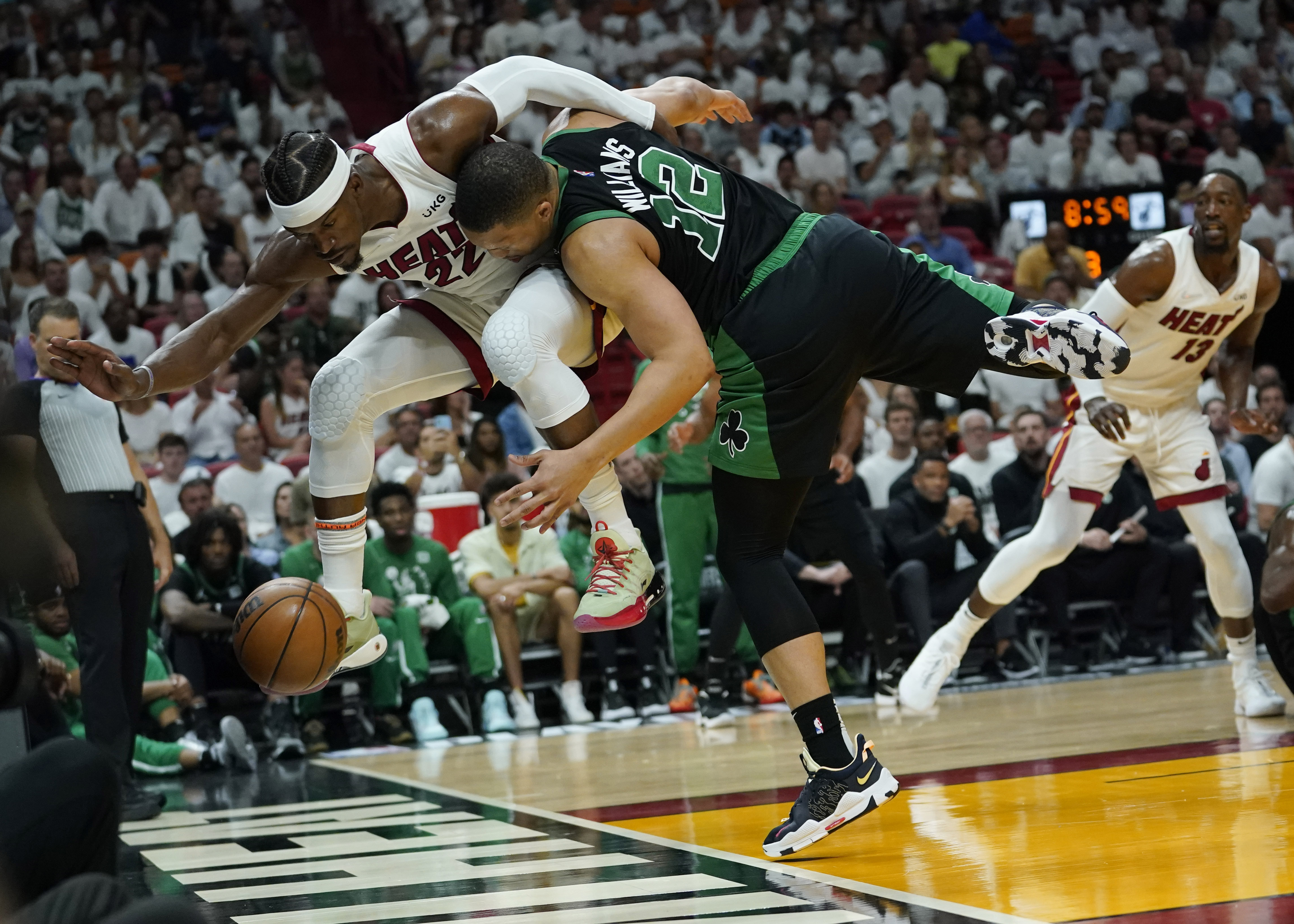 Miami Heat forward Duncan Robinson (55) controls the ball against Boston  Celtics center Al Horford (42) in the second quarter during game seven of  the Eastern Conference Finals for the 2023 NBA
