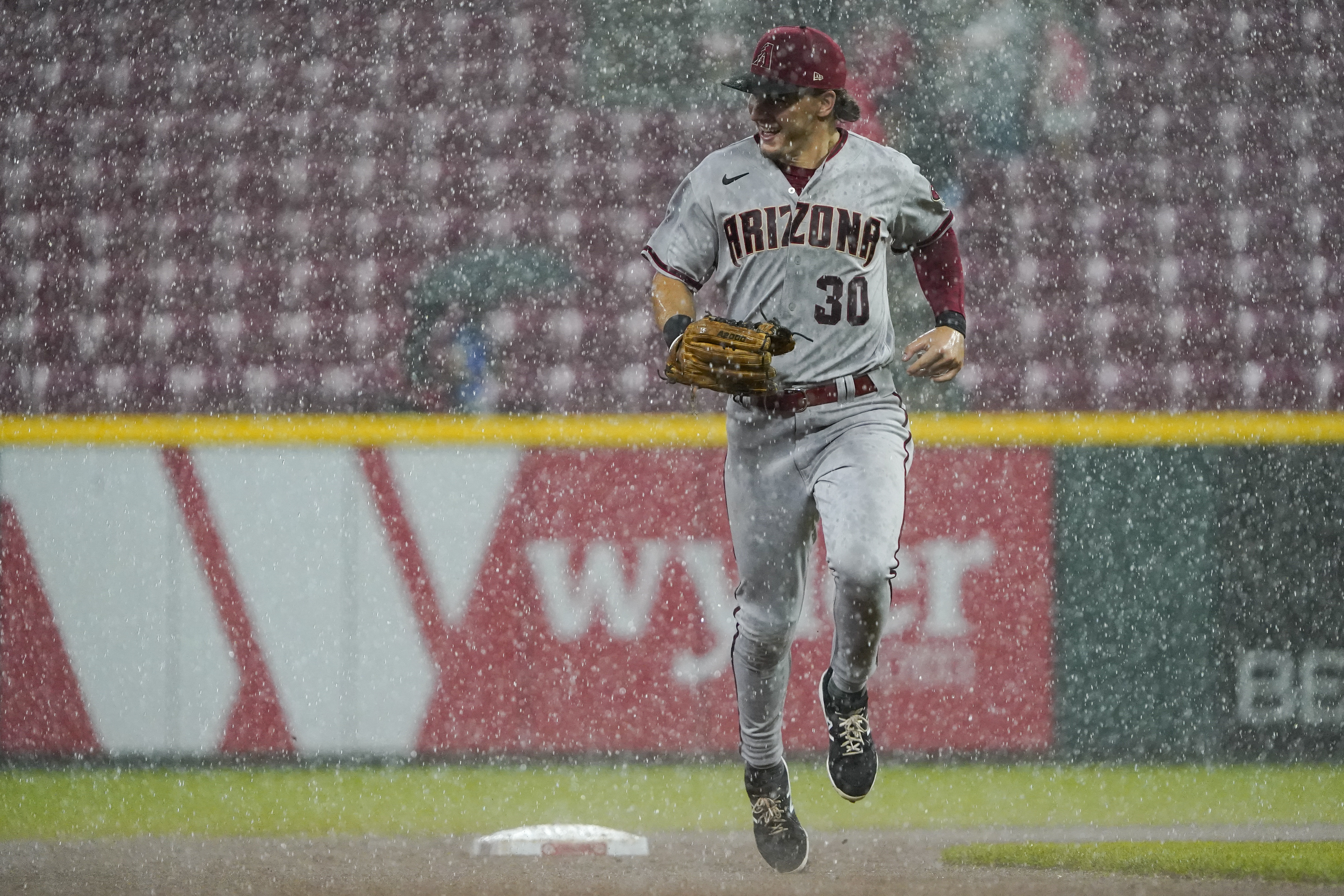 Reds' Hunter Greene allows one baserunner in rain-shortened win