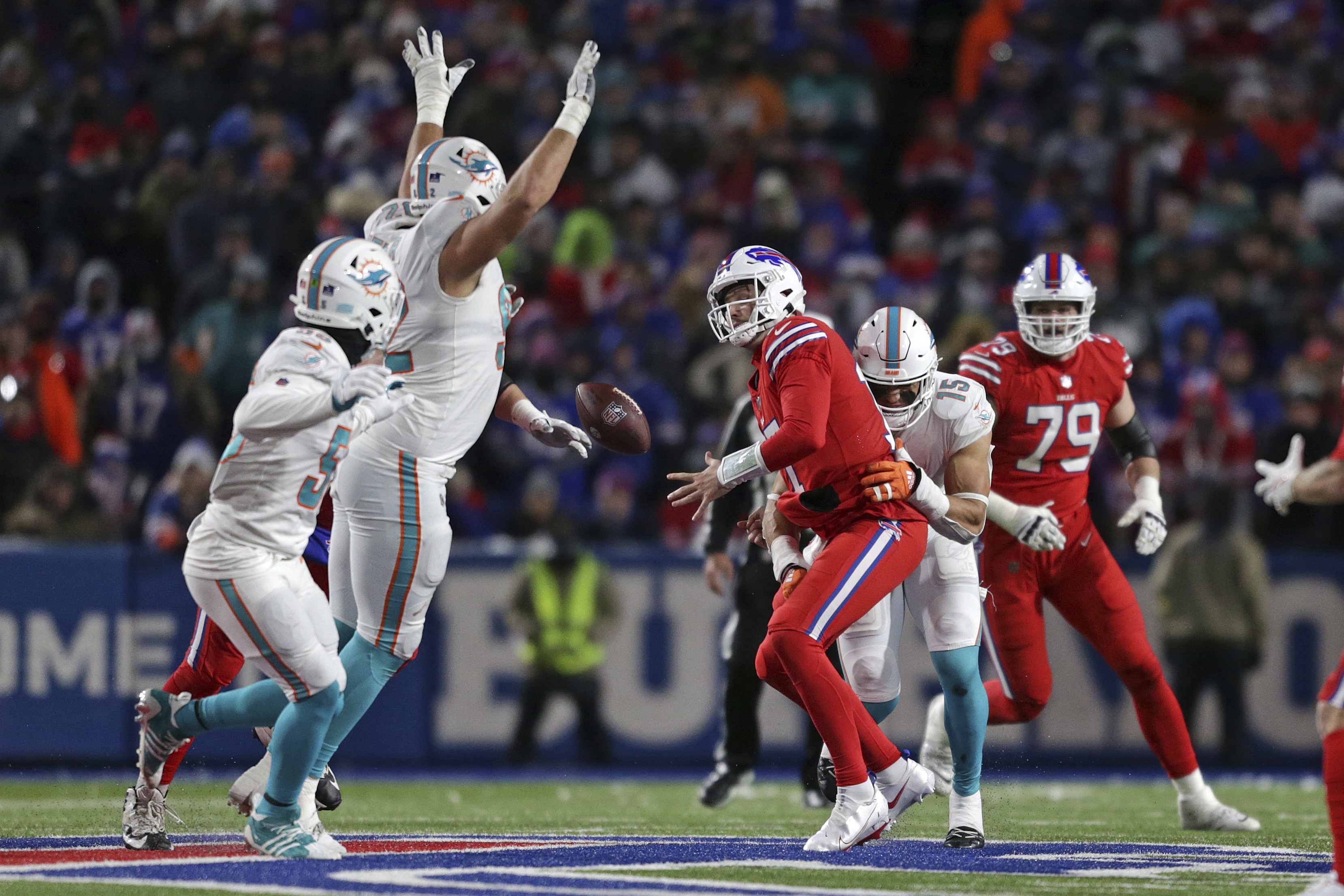 Bills clinch 4th straight playoff berth; beat Dolphins 32-29