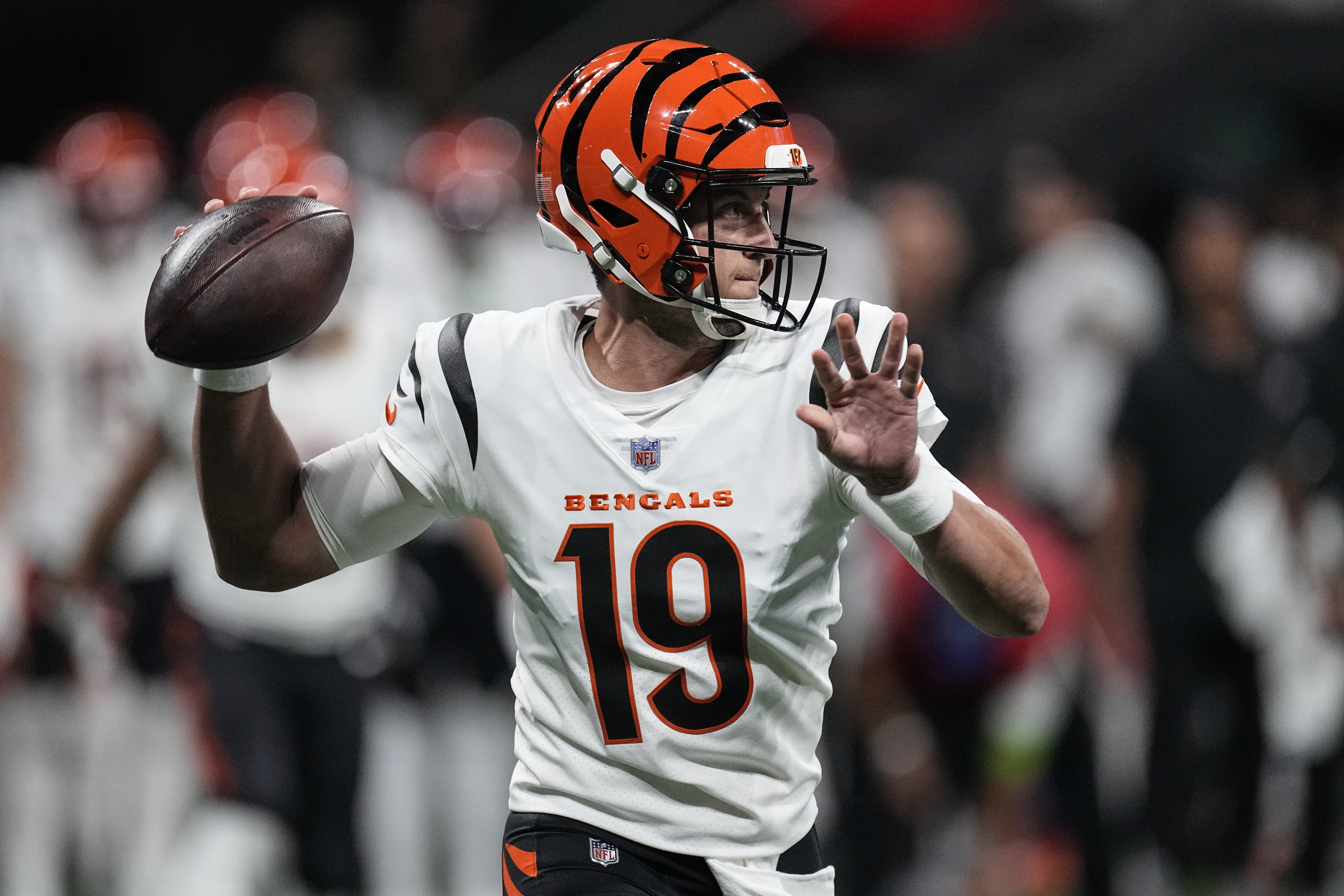 Cincinnati Bengals quarterback Jake Browning shows off his mobility with a  12-yard scramble to escape a muddy pocket