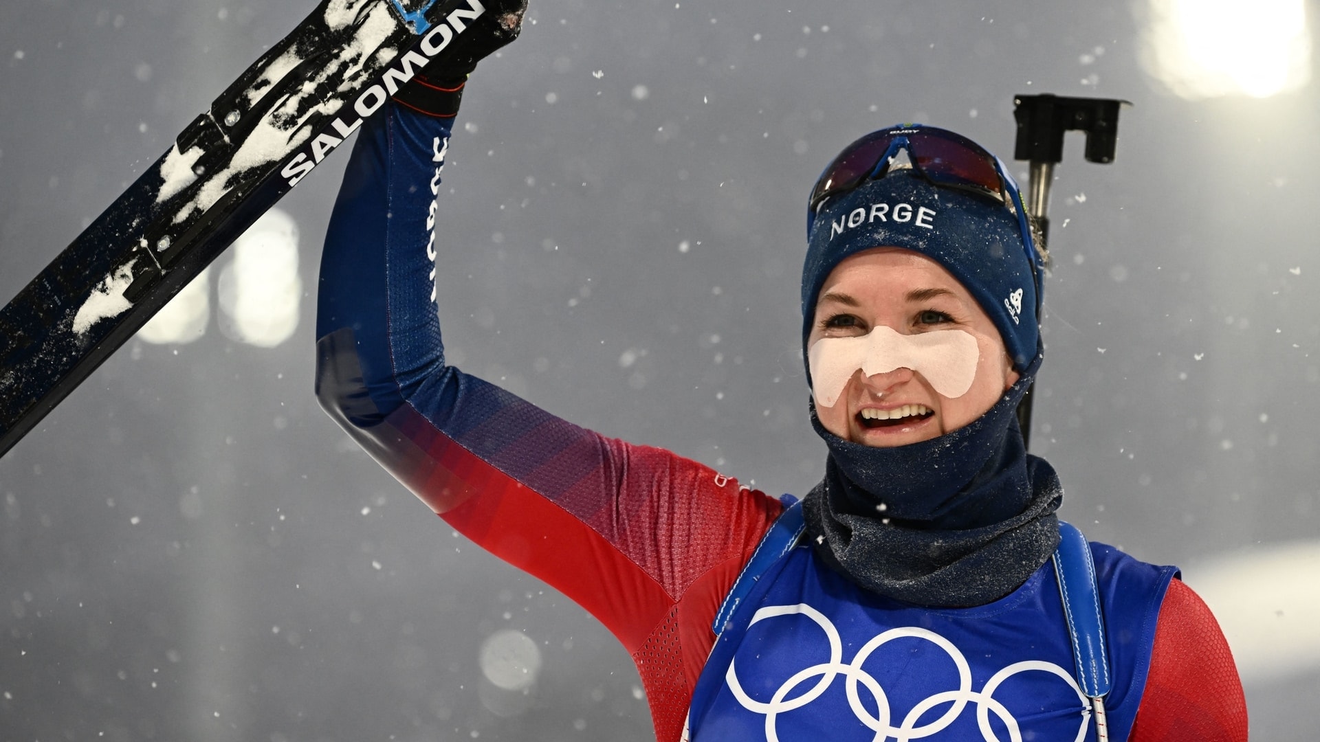 Roeiseland makes biathlon history with third Olympic gold in 10km pursuit