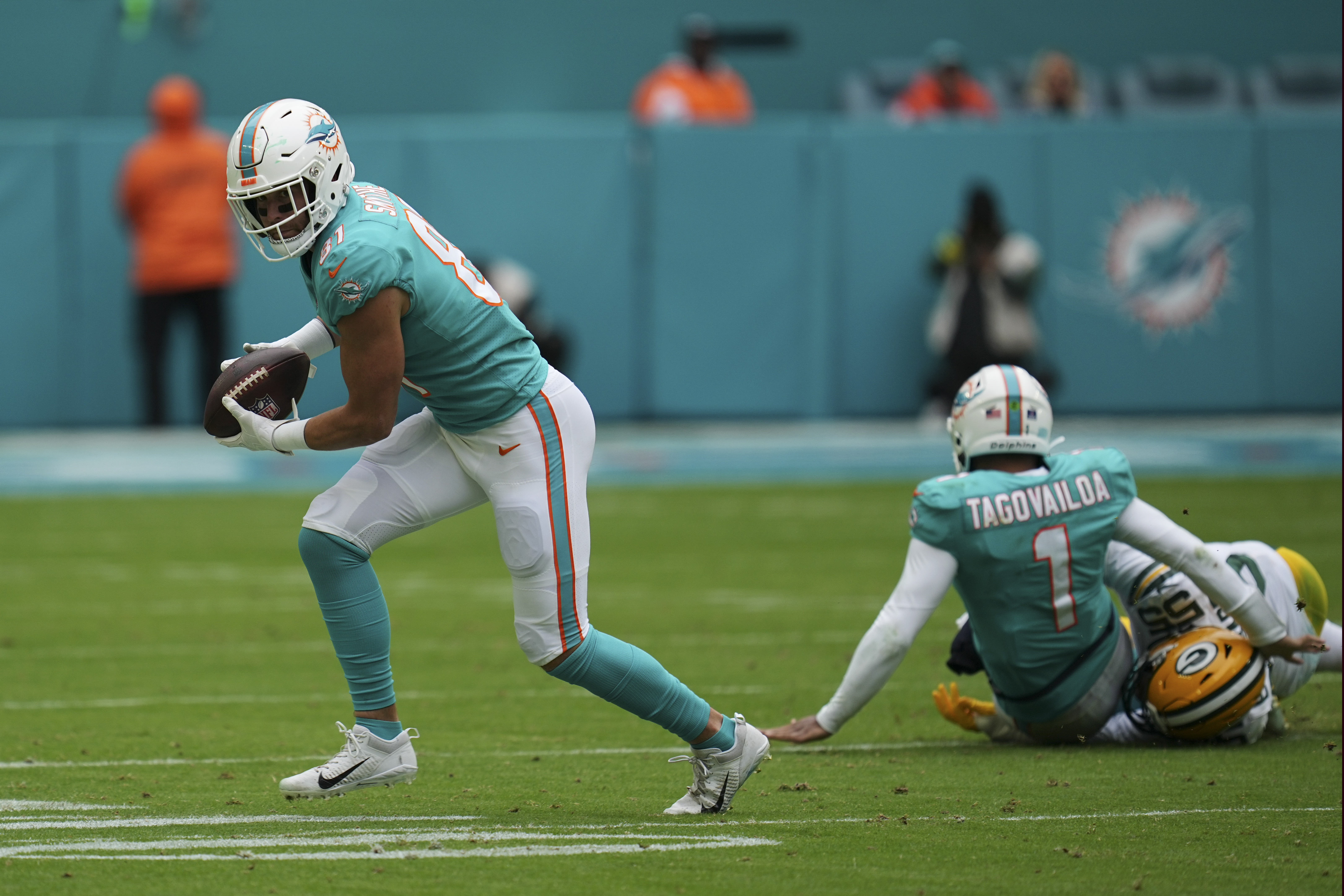 Dugger interception return helps Patriots beat Dolphins 23-21