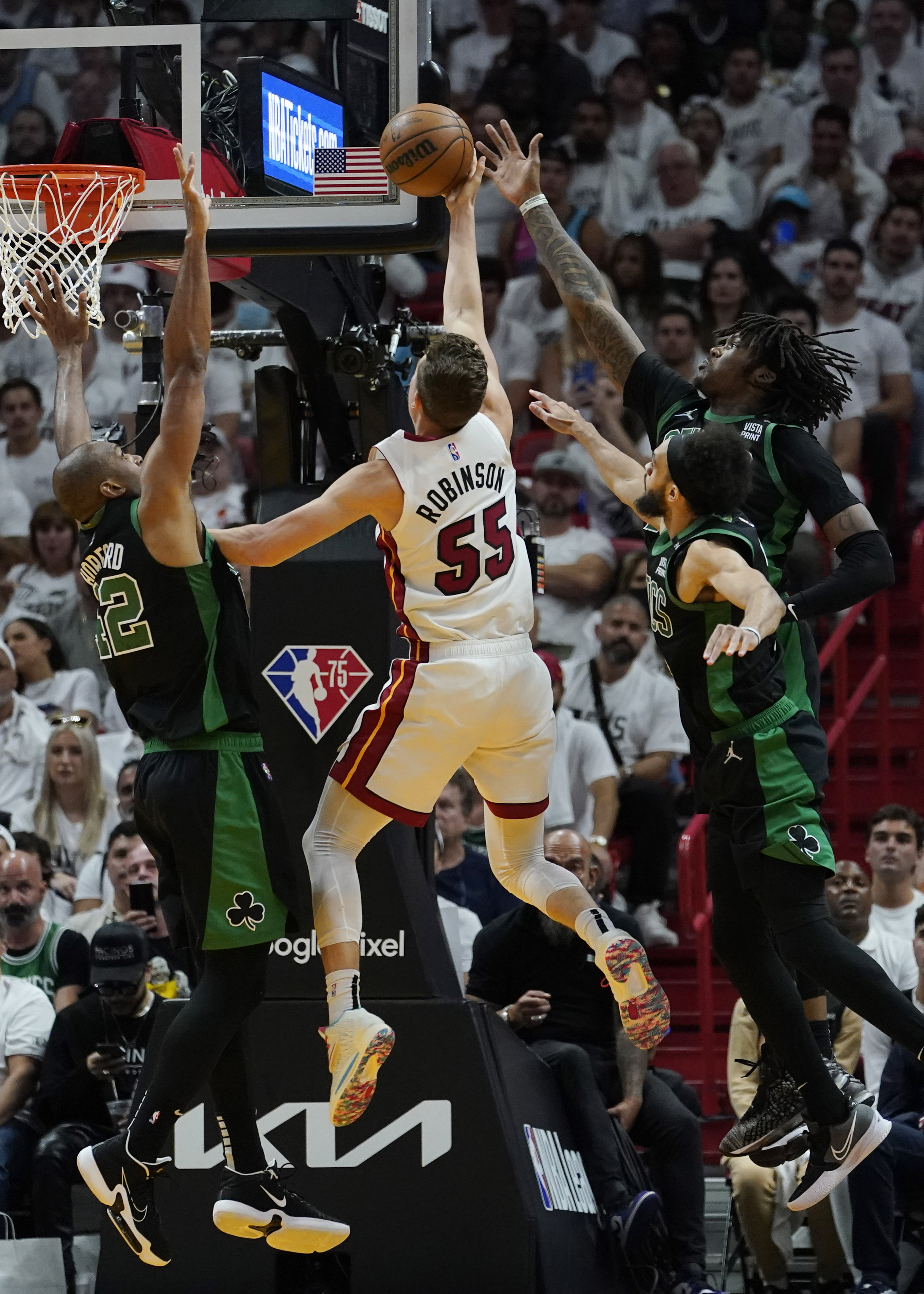 Miami Heat forward Duncan Robinson (55) controls the ball against Boston  Celtics center Al Horford (42) in the second quarter during game seven of  the Eastern Conference Finals for the 2023 NBA