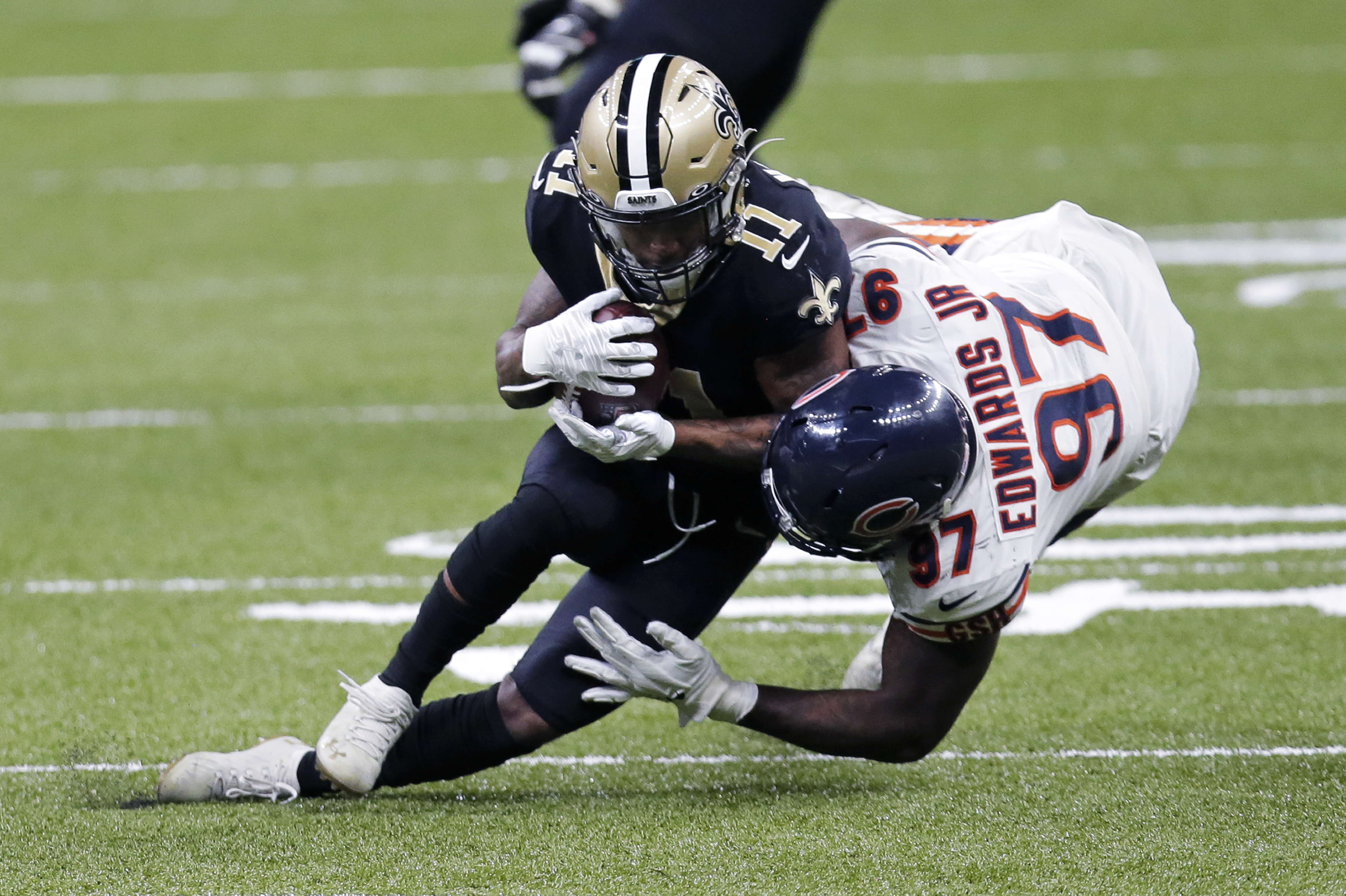 Brees, Saints pull away late for 21-9 playoff win over Bears