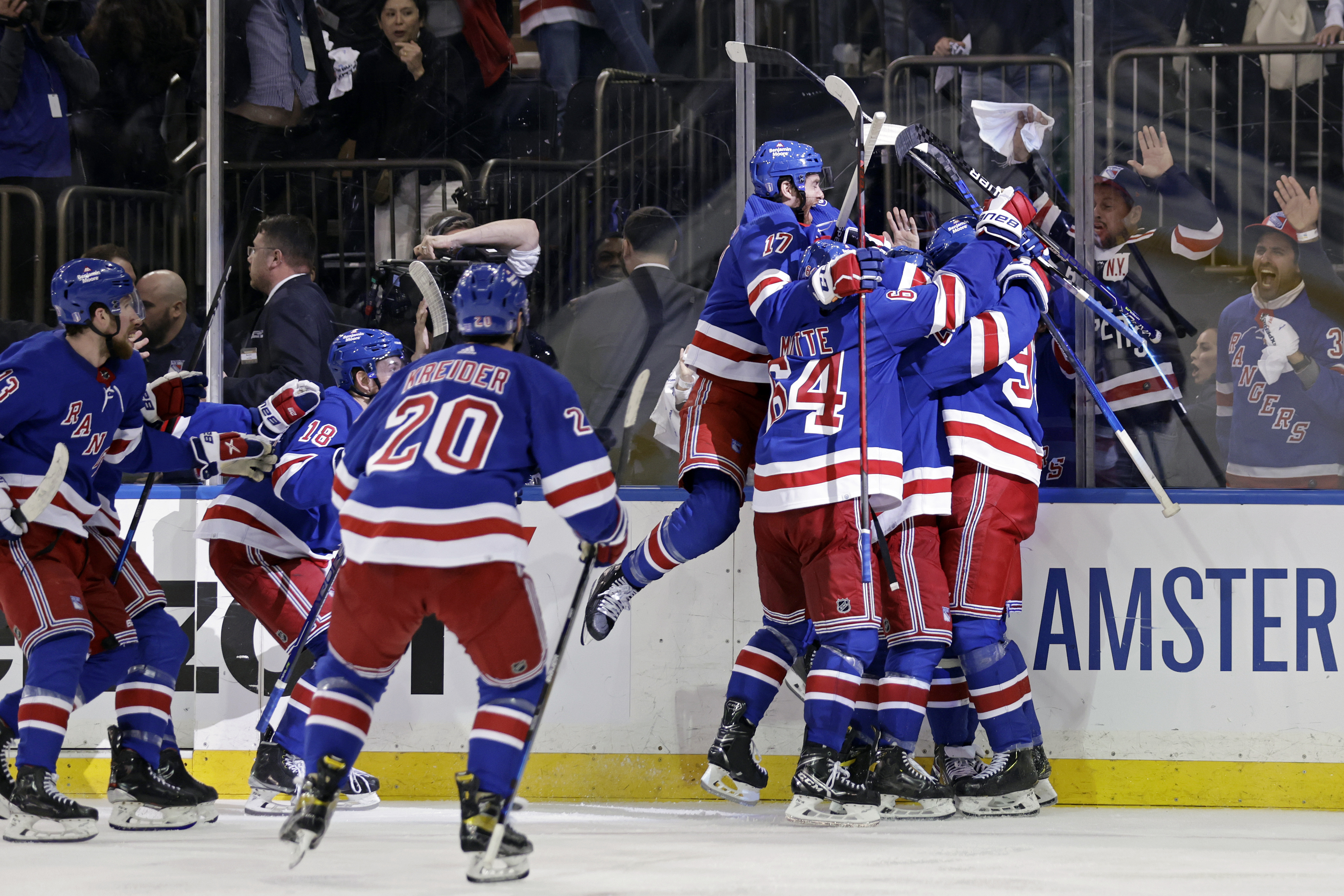 Philadelphia Flyers' Claude Giroux battles with New York Rangers