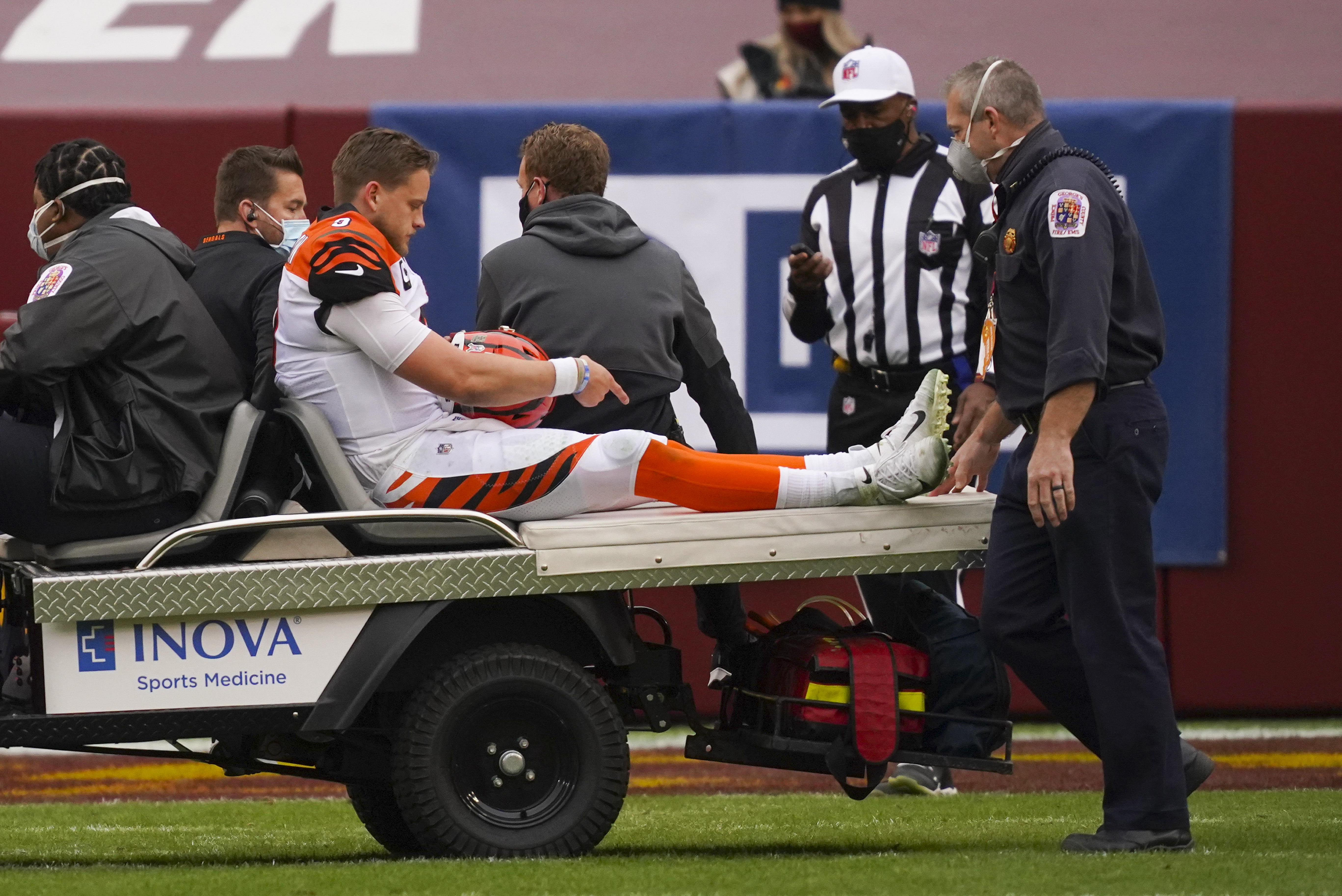 Joe Burrow injury: Bengals quarterback carted off after hit to knee