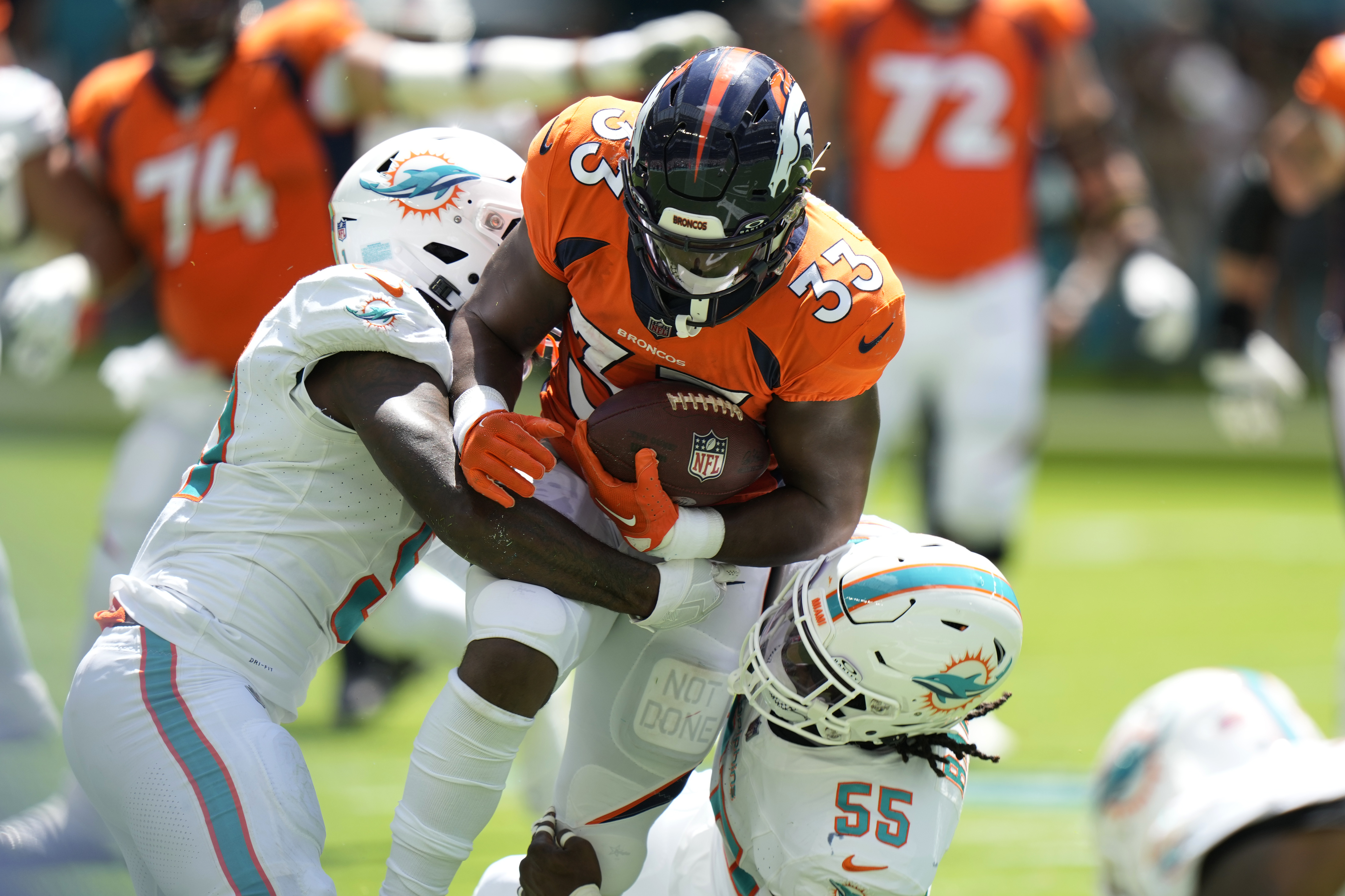 Video-game type stuff:' Dolphins hang 70 points on Broncos, top