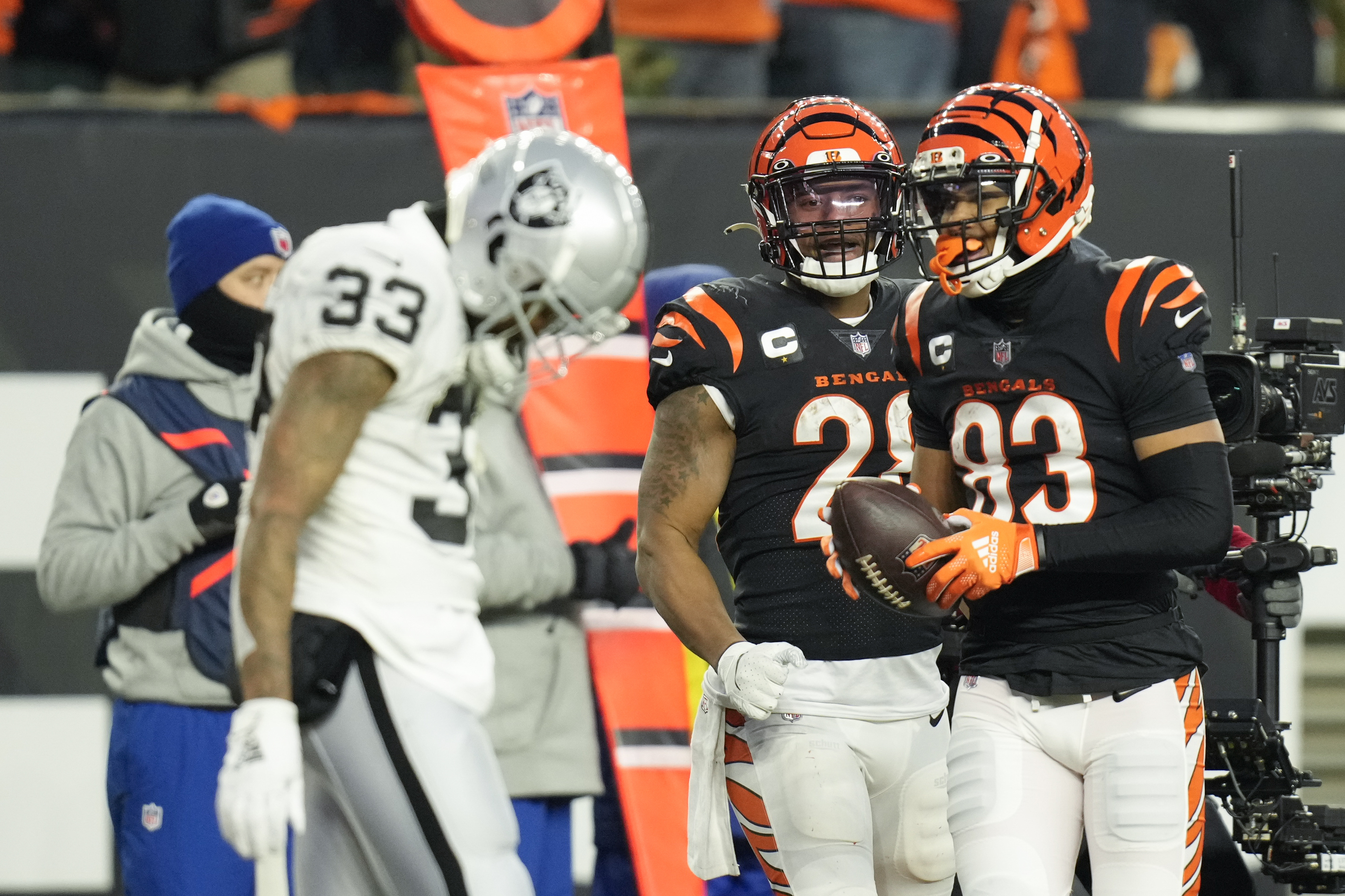 Raiders safety Roderic Teamer (33) tackled Cincinnati Bengals wide receiver  Tyler Boyd (83) in …