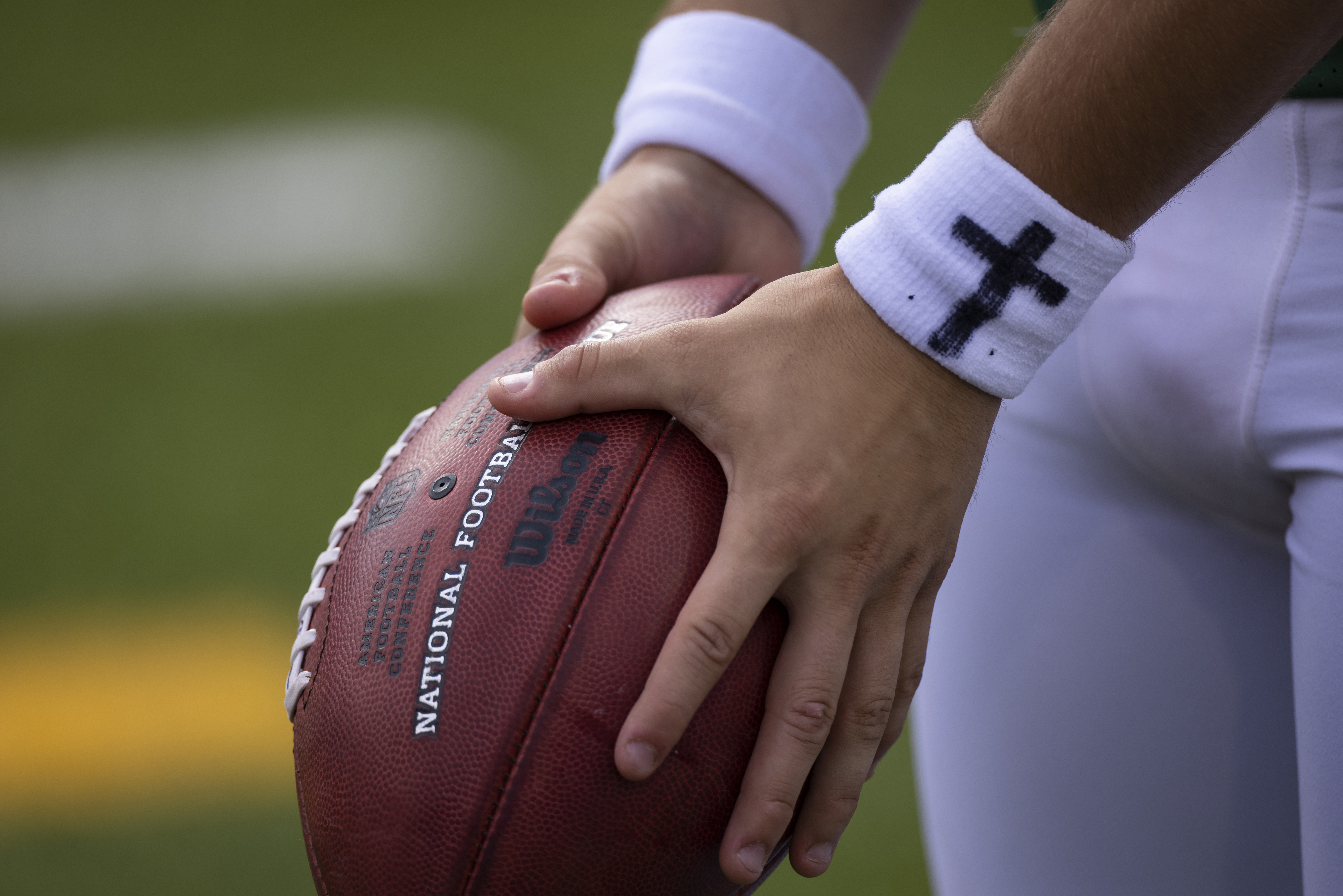 Braden Mann of the New York Jets reacts as he runs off the field