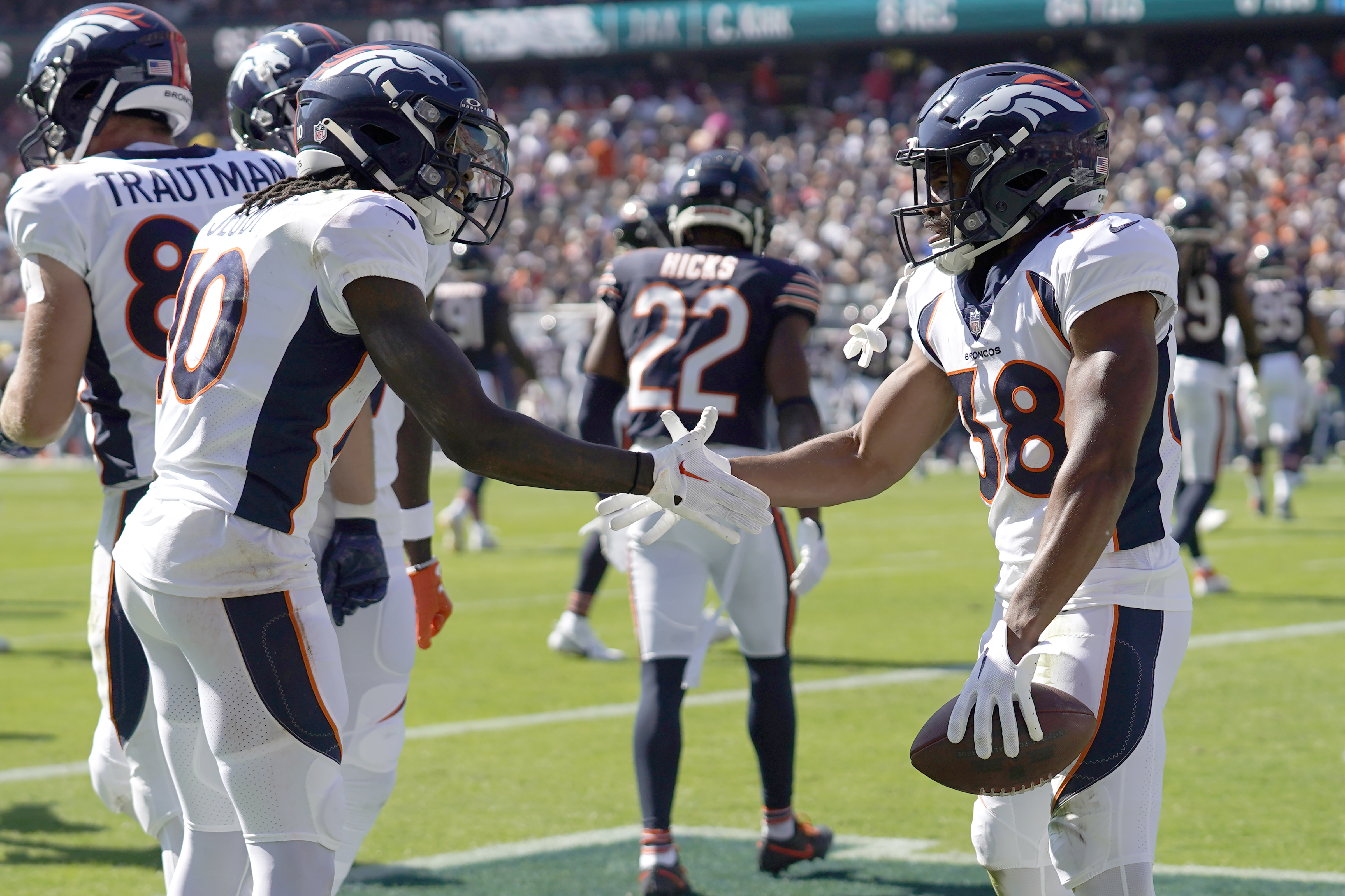 Russell Wilson throws 3 TDs, Broncos rally from 21 down to top Bears 31-28