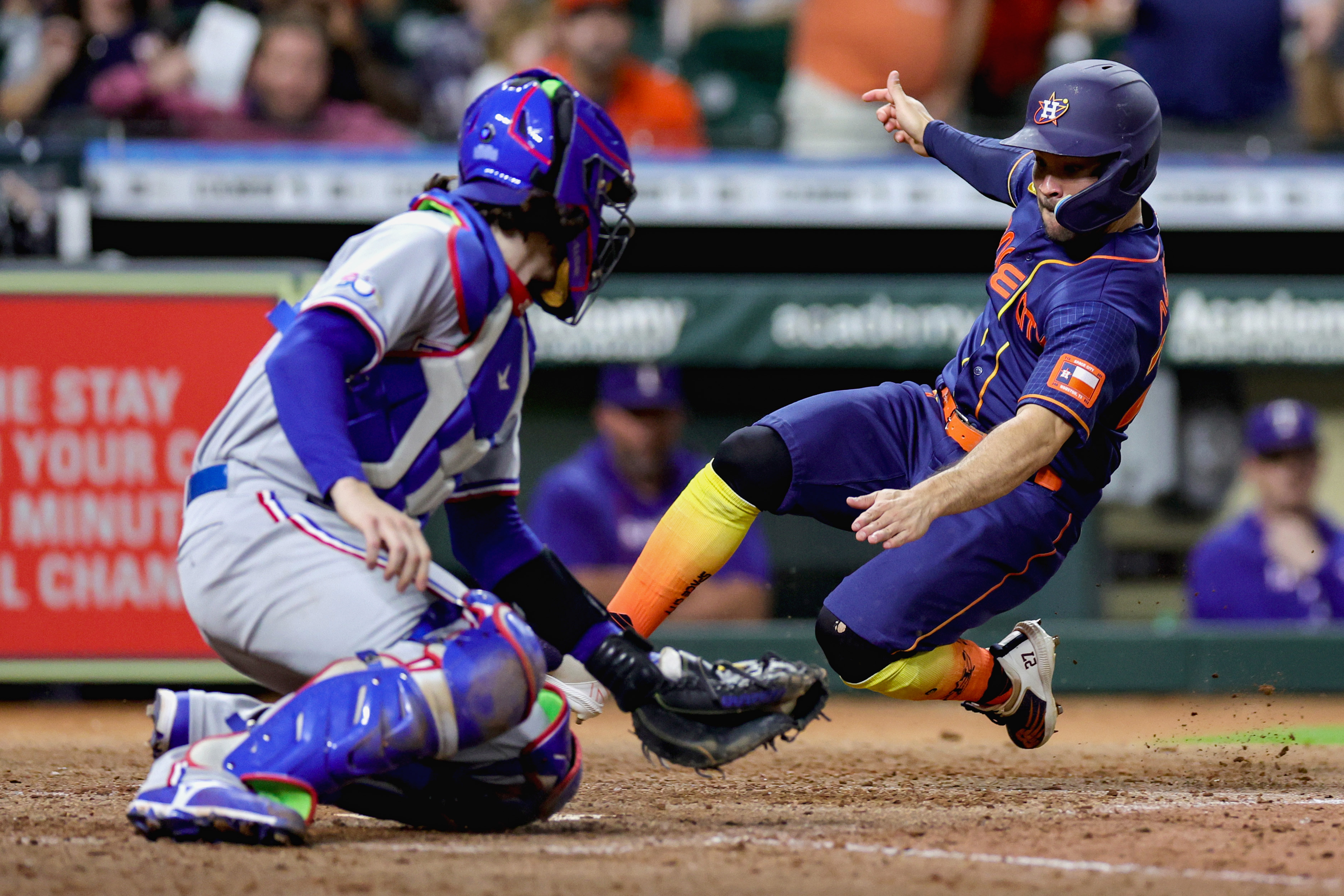 Texas Rangers' Ezequiel Duran, left, is caught stealing second