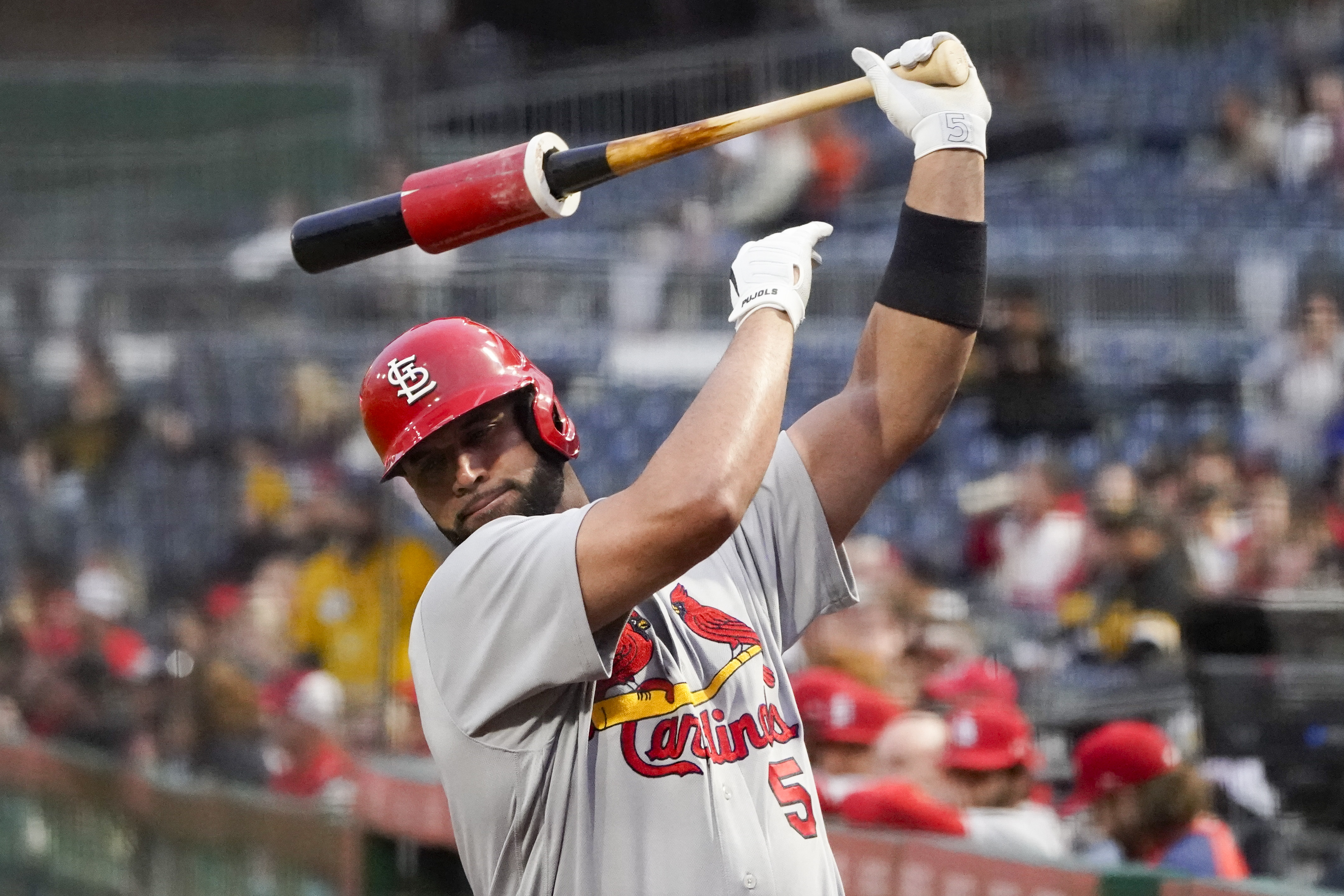 Albert Pujols, Rodolfo Castro chat at second base during game