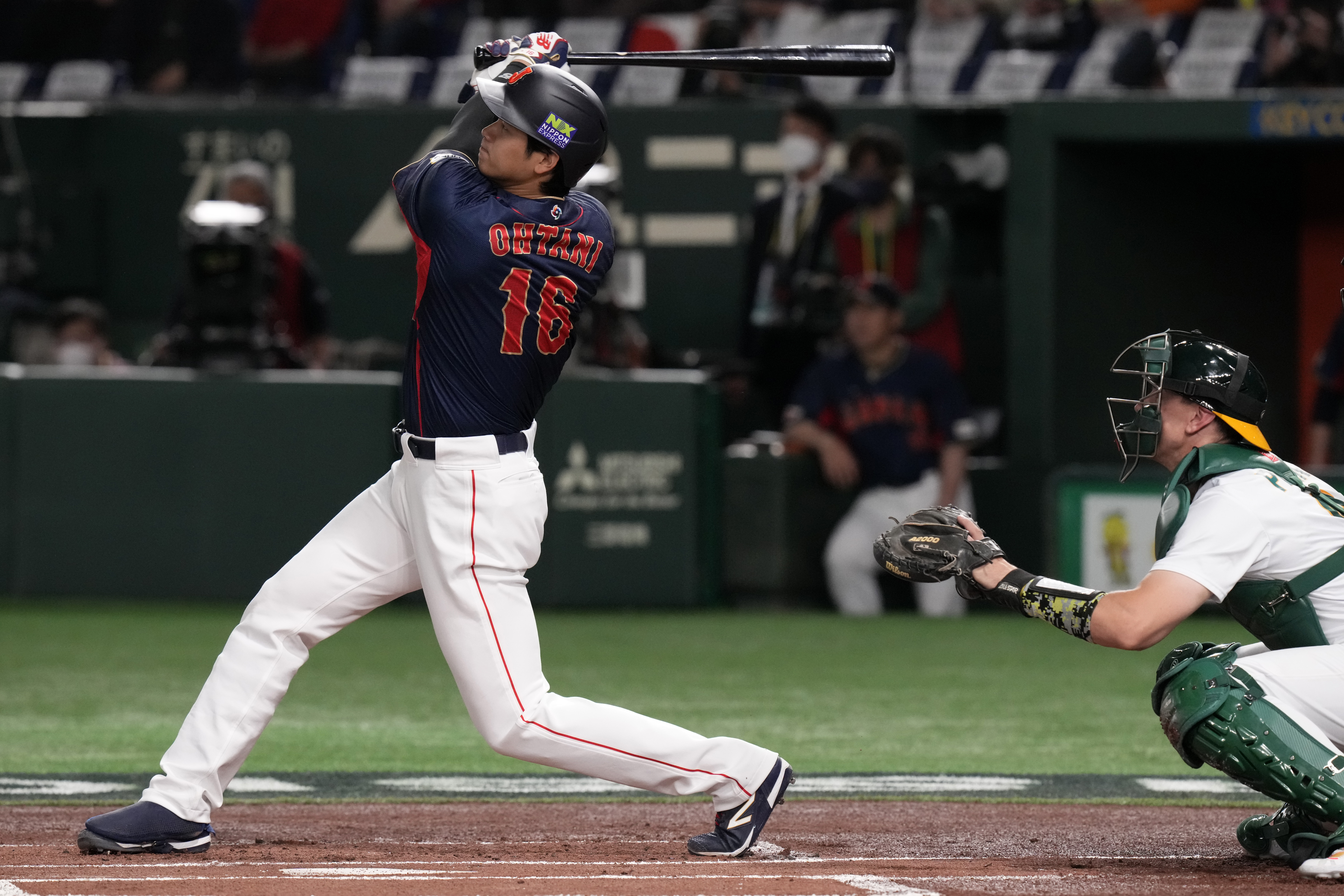Ohtani's long HR powers Japan to group win at WBC