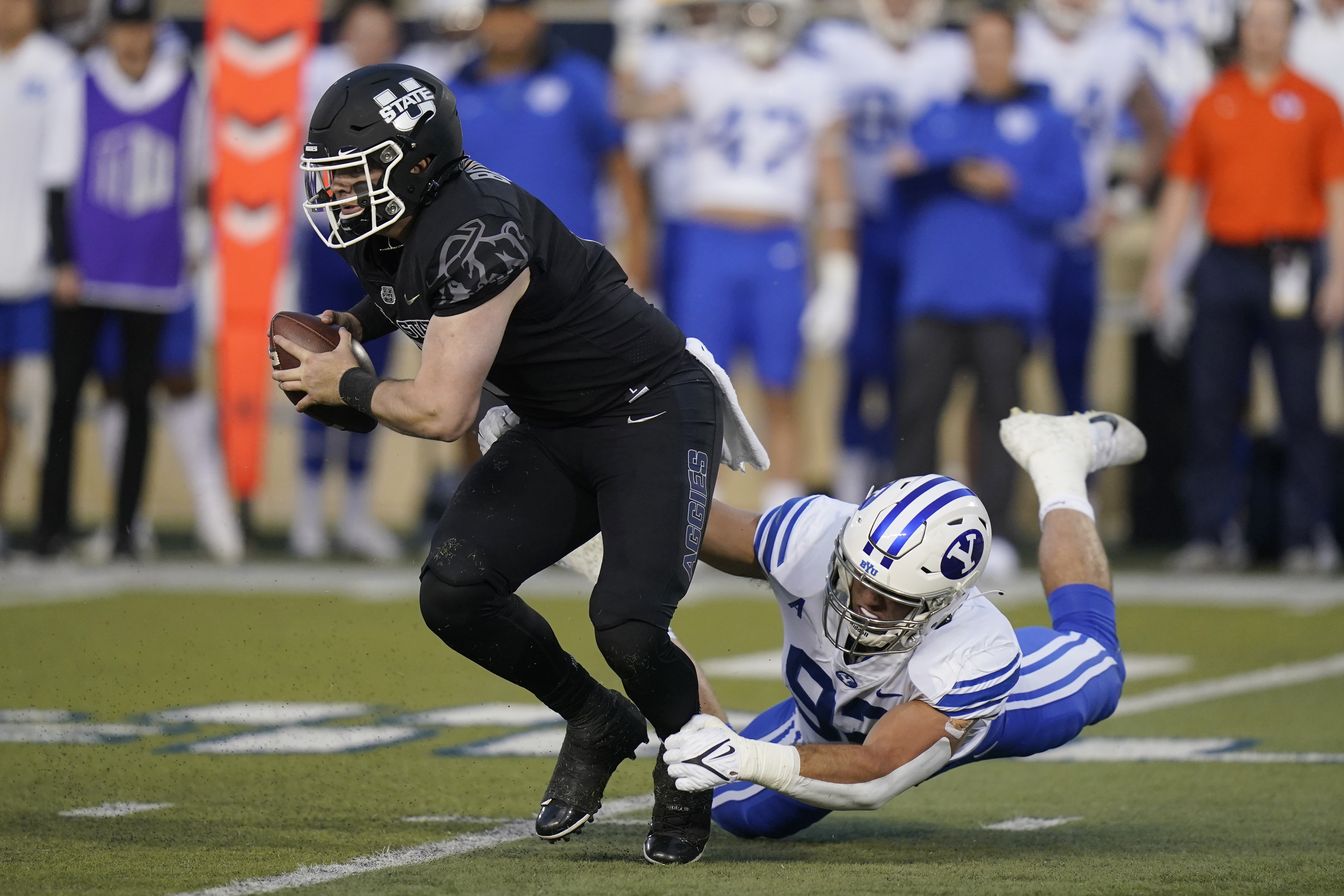 Tyler Allgeier, No. 13 BYU run past Utah State 34-20