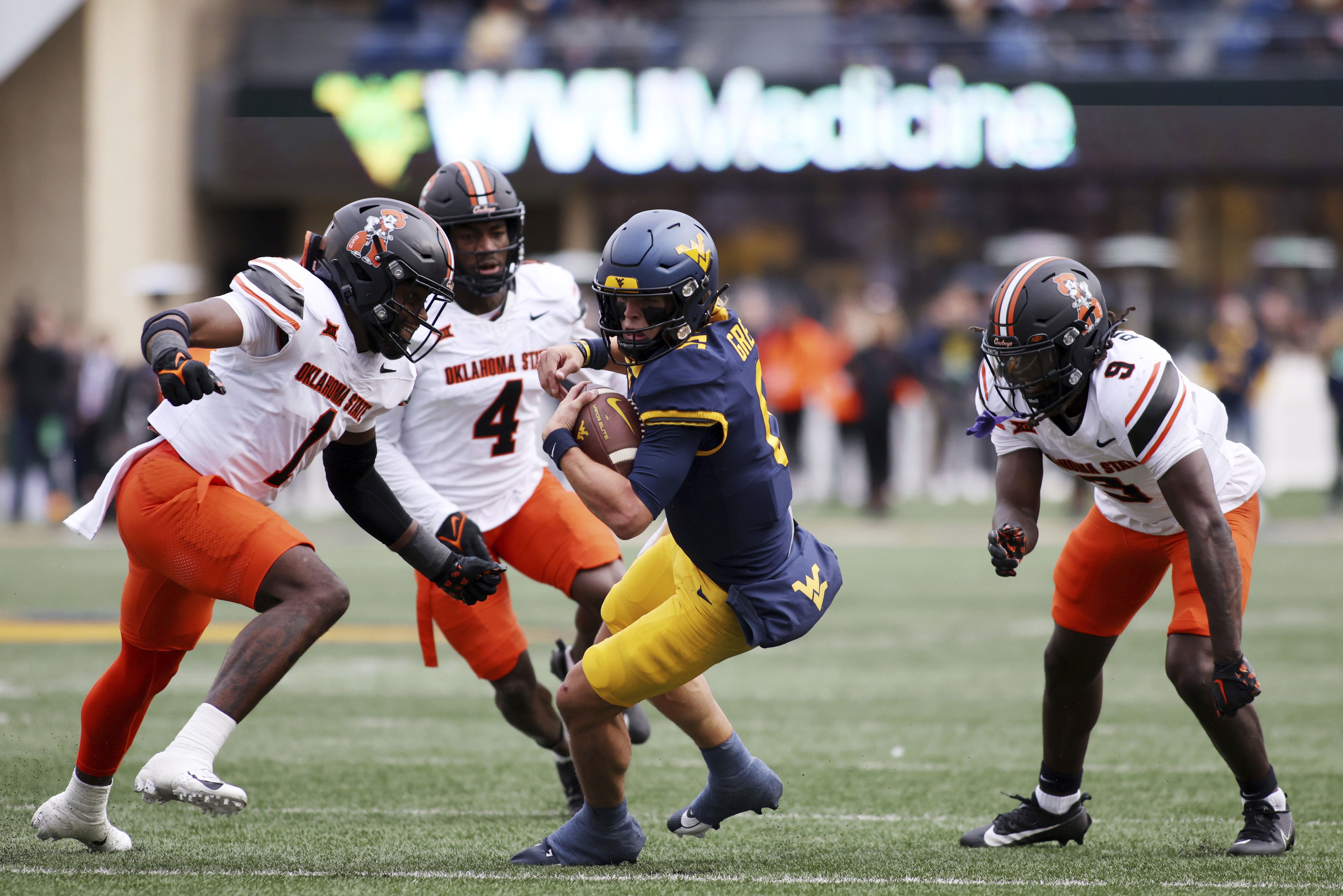 Gordon romps for 282 yards, 4 TDs, Oklahoma State outlasts West