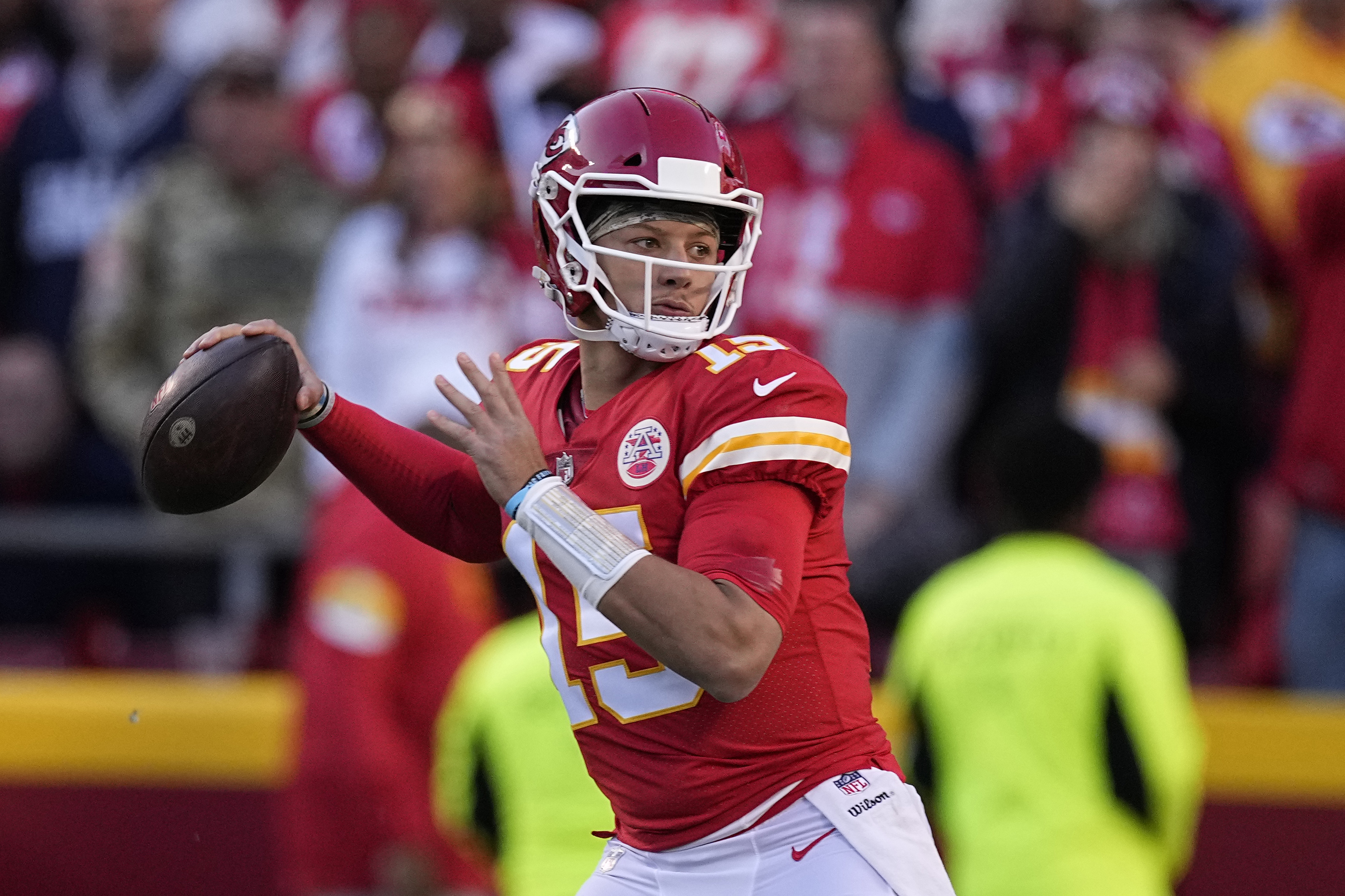 Kansas City Chiefs quarterback Patrick Mahomes looks to pass during the  first half of an NFL football game against the Buffalo Bills Sunday, Oct.  10, 2021, in Kansas City, Mo. (AP Photo/Charlie