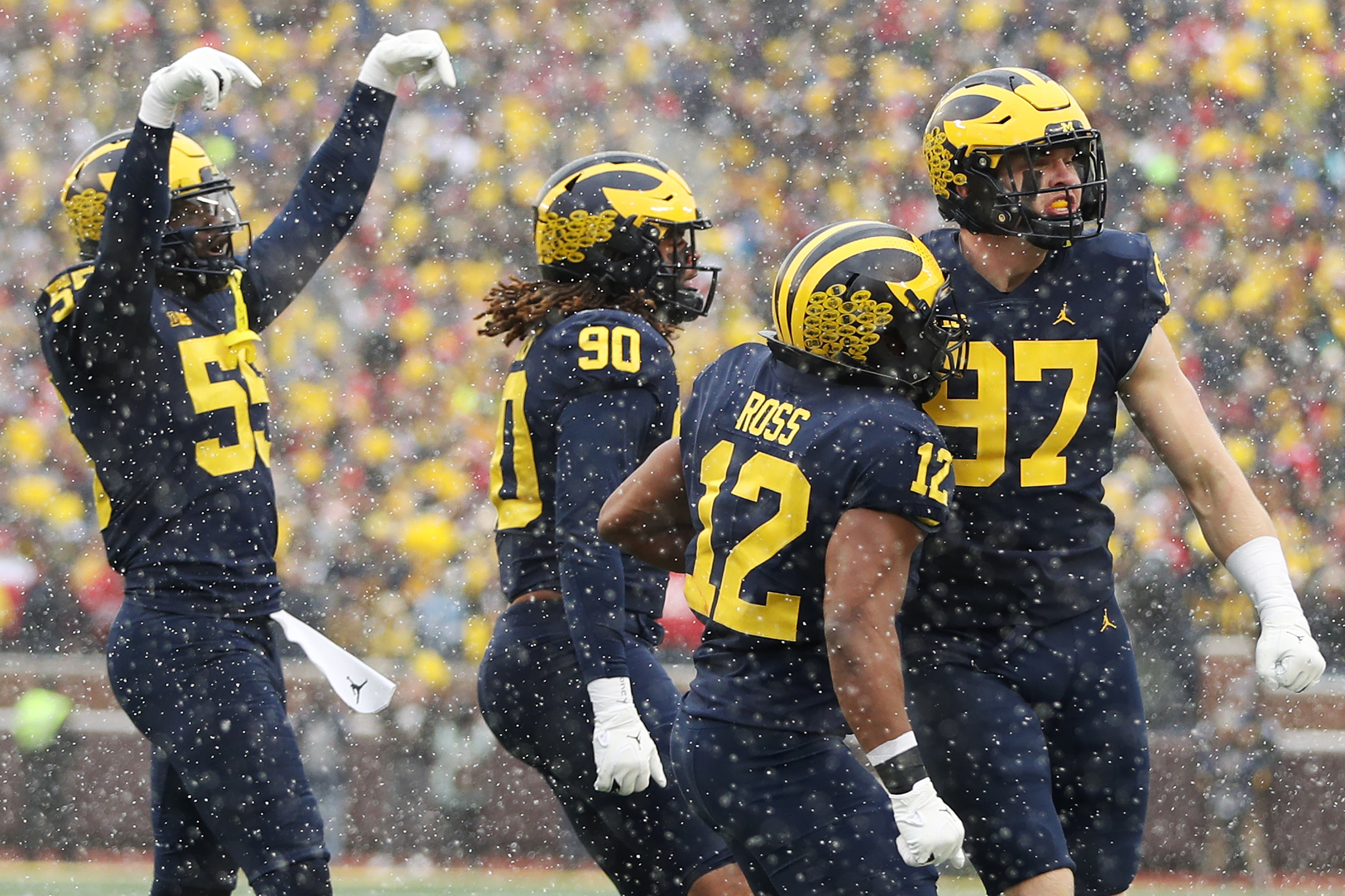 Incredible hurdle by Michigan RB Hassan Haskins