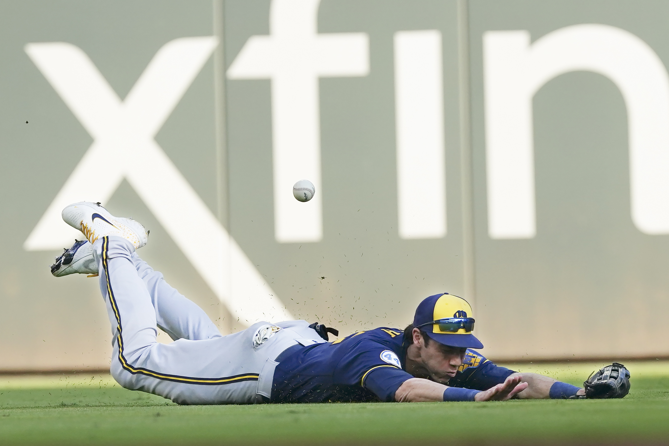 Bats finally wake up but Hader falters, Brewers eliminated