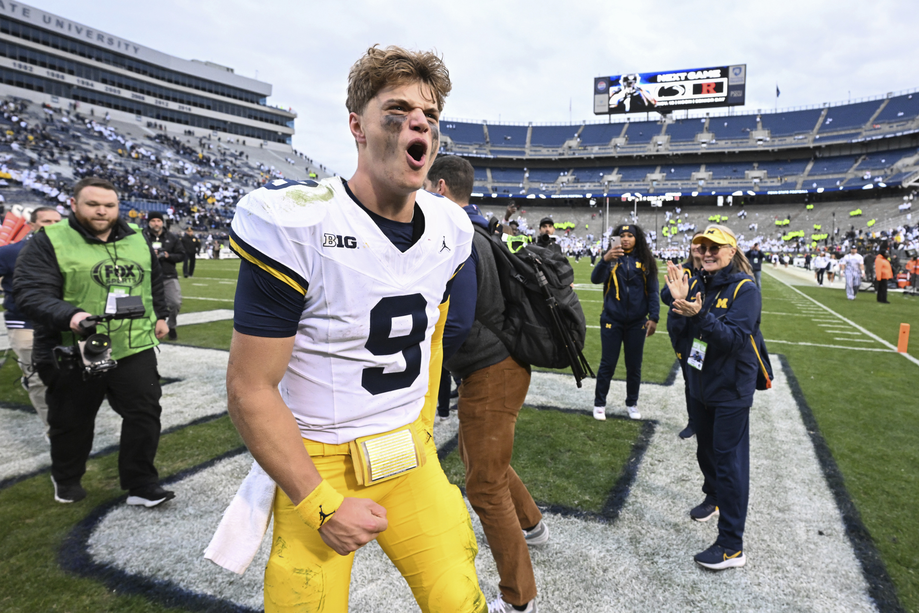 Without Jim Harbaugh, No. 2 Michigan grinds past No. 9 Penn State