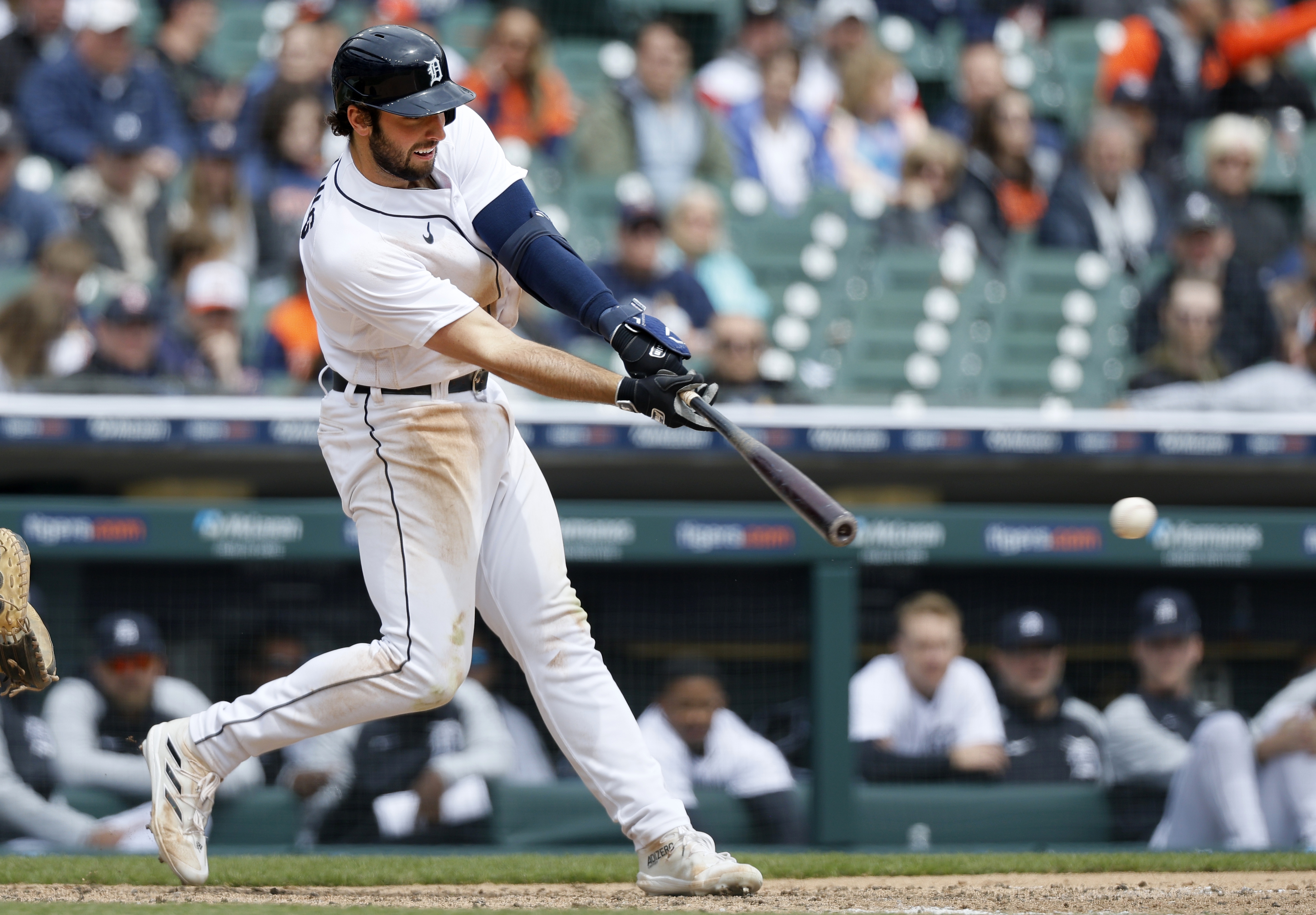 Zack Short of the Detroit Tigers looks on from the dugout while News  Photo - Getty Images