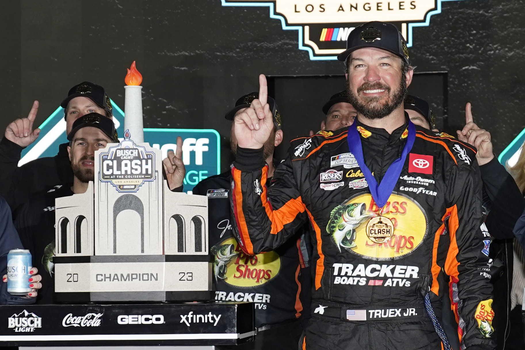 Truex wins NASCARs sloppy return to Los Angeles Coliseum