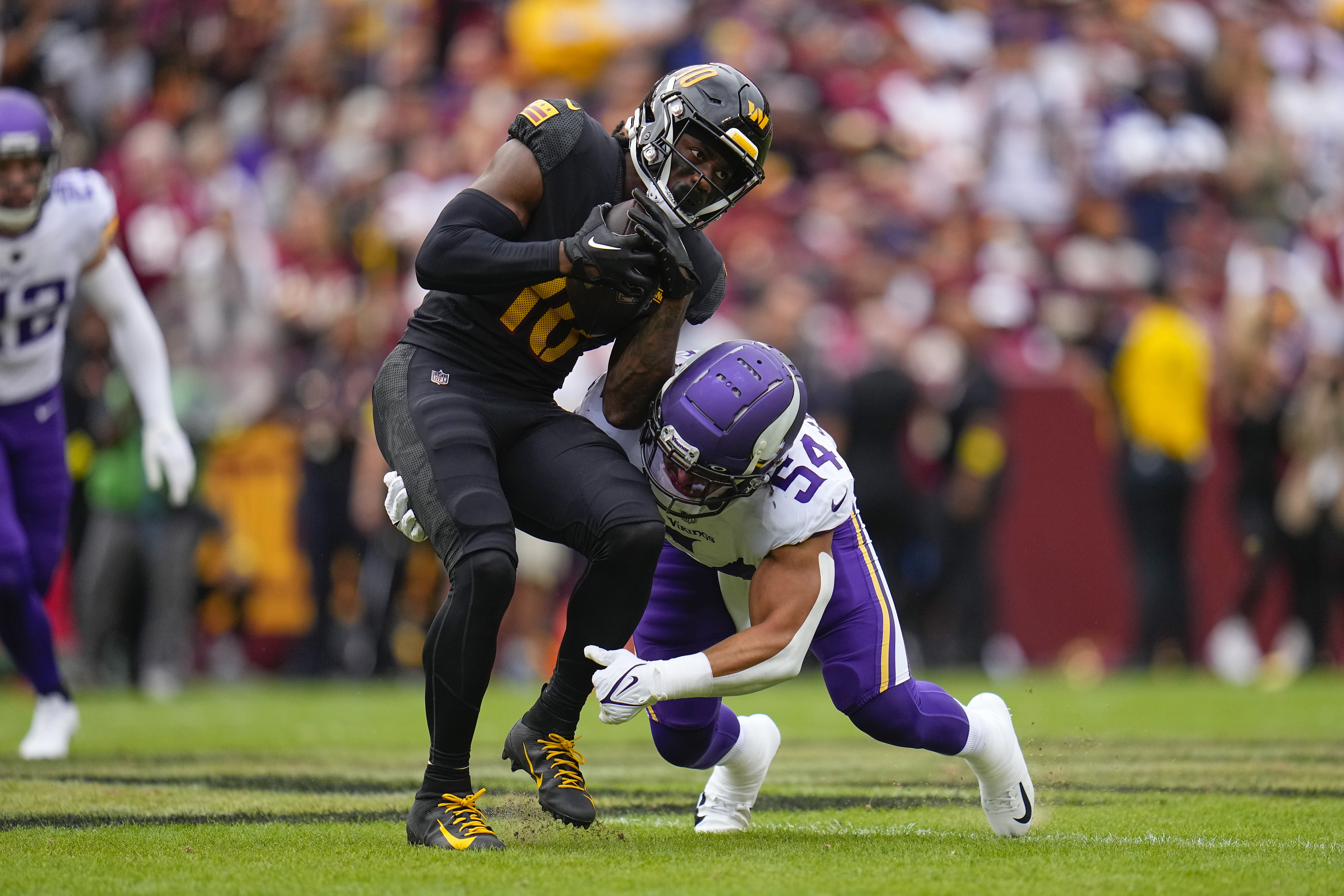 LANDOVER, MD - NOVEMBER 06: Minnesota Vikings running back Dalvin Cook (4)  reacts after a touchdown during the NFL game between the Minnesota Vikings  and the Washington Commanders on November 6, 2022