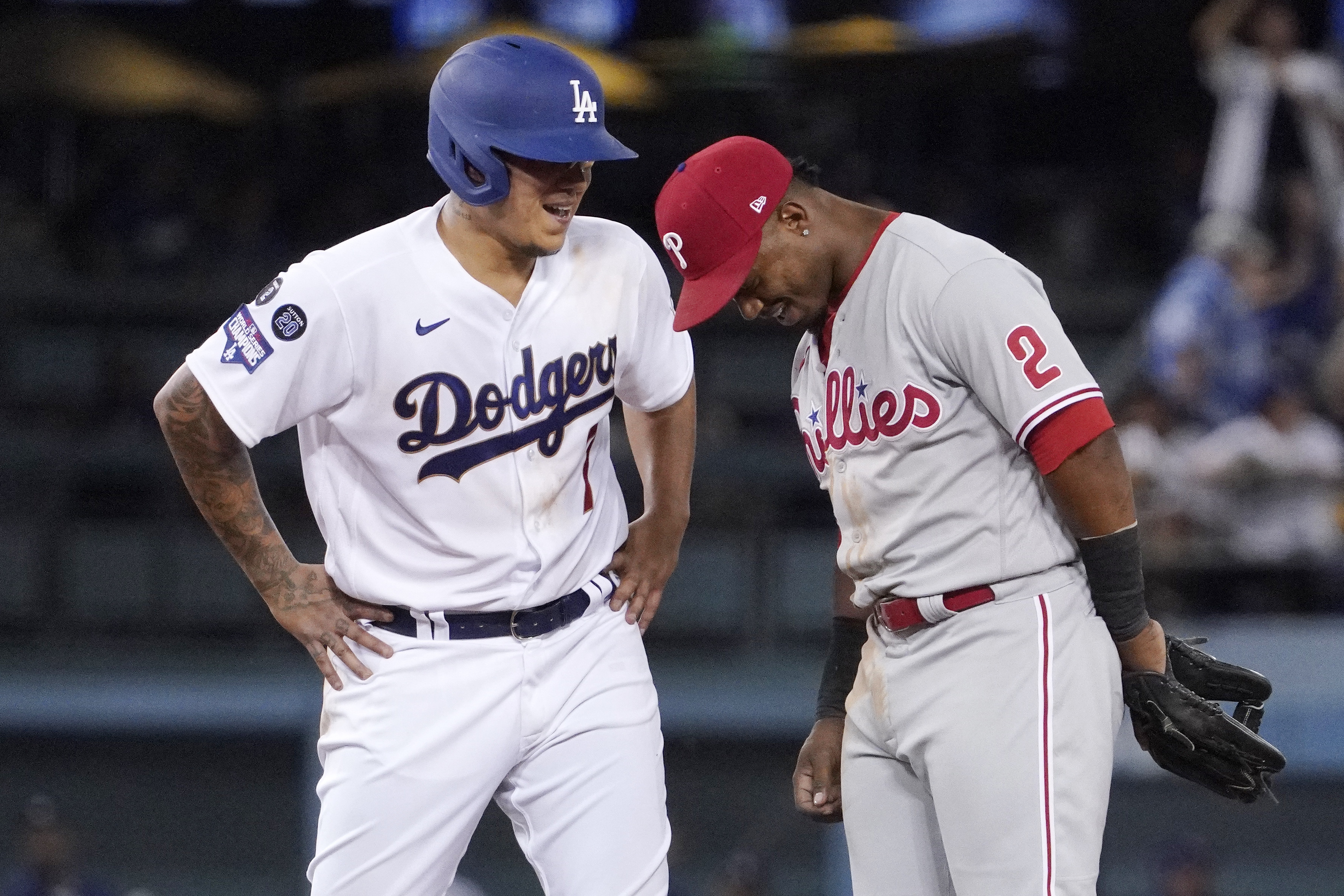 Los Angeles Dodgers' Yoshi Tsutsugo runs to first base during a