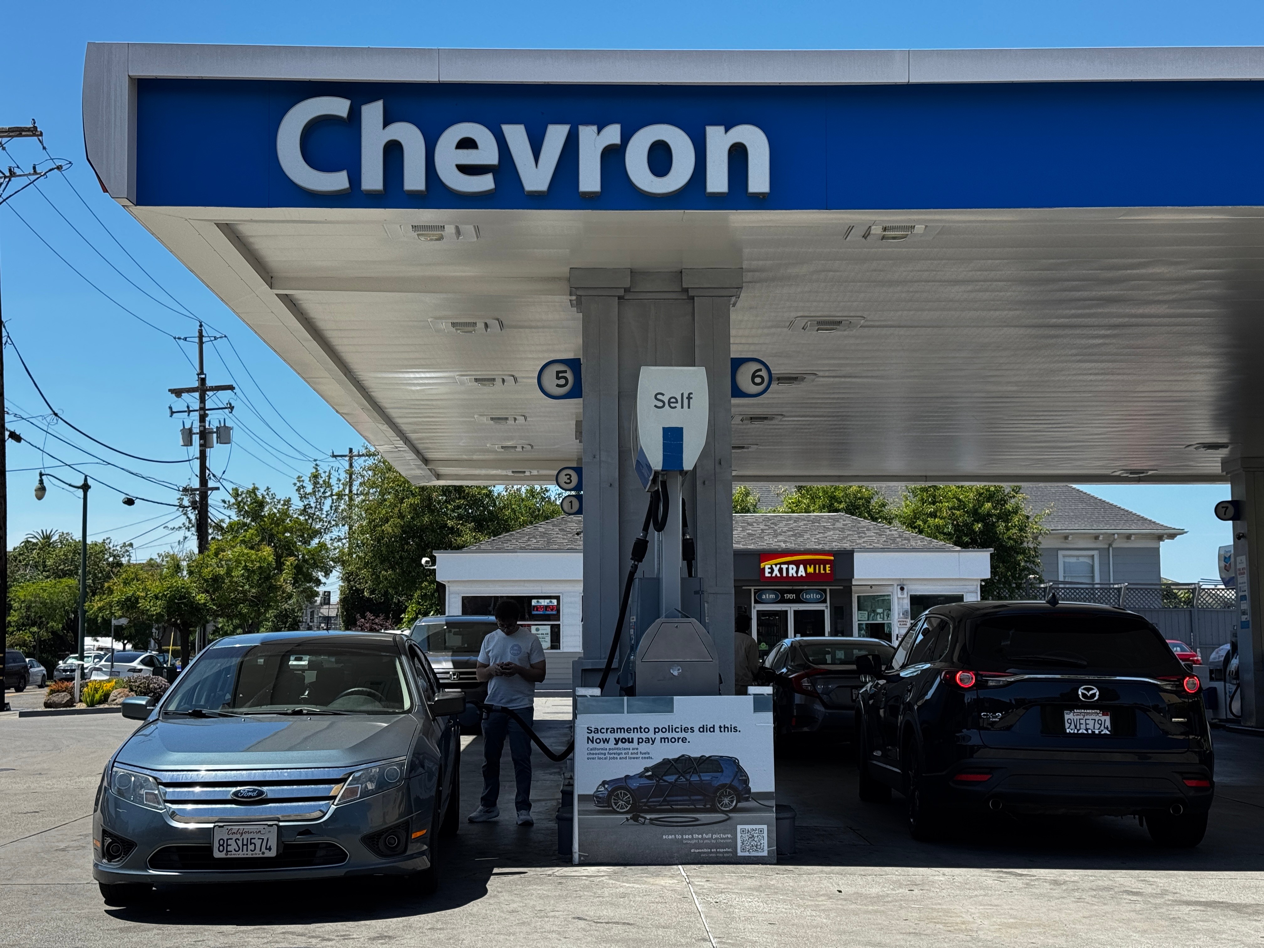 chevron cigarette prices Chevron "gas station" sign, showing possible future price of six ^US dollars per gallon, USA Stock Photo chevron cigarette prices Chevron openly
