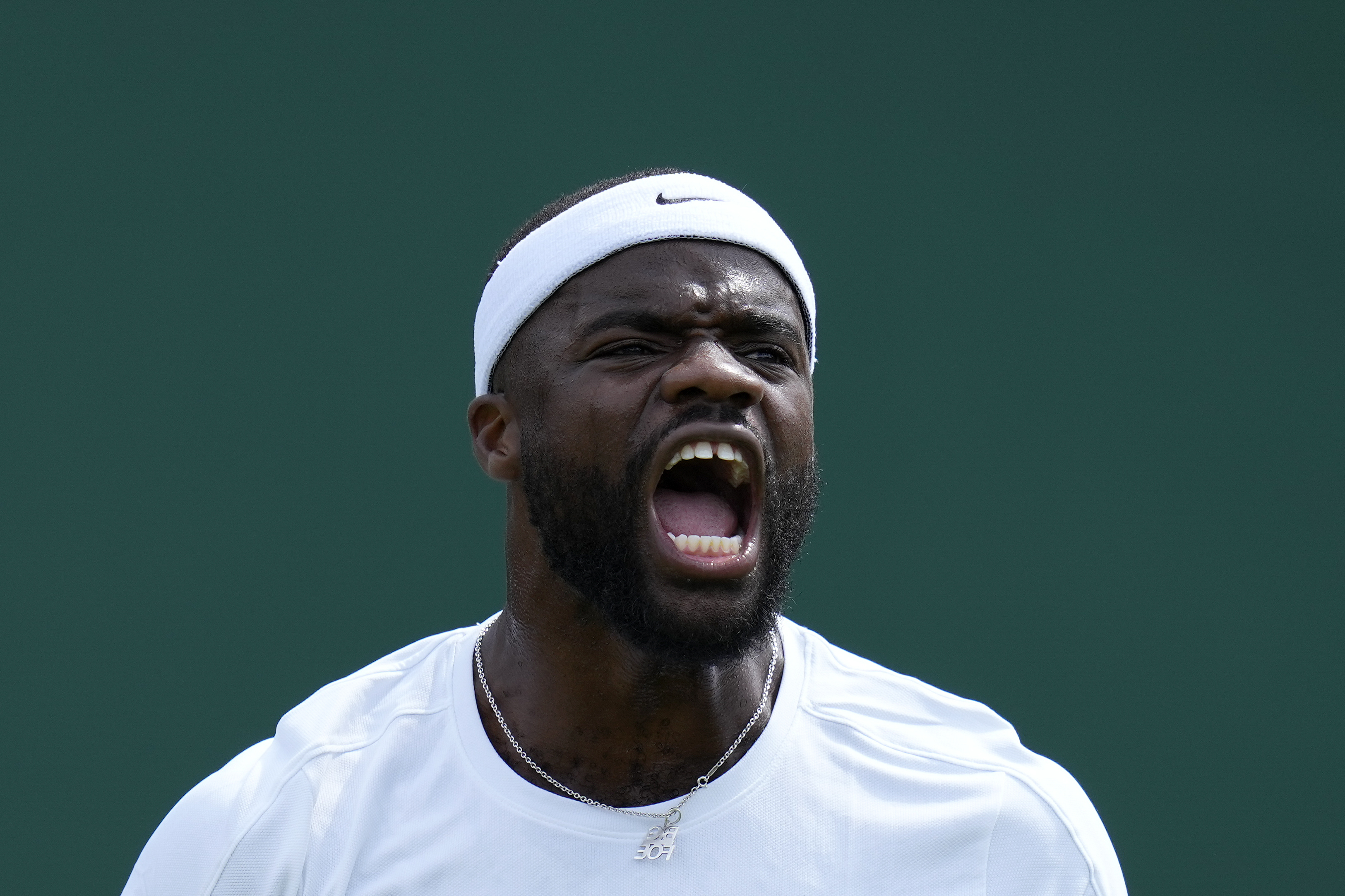 Novak Djokovic and Iga Swiatek won at Wimbledon. Protesters and rain  captured the attention