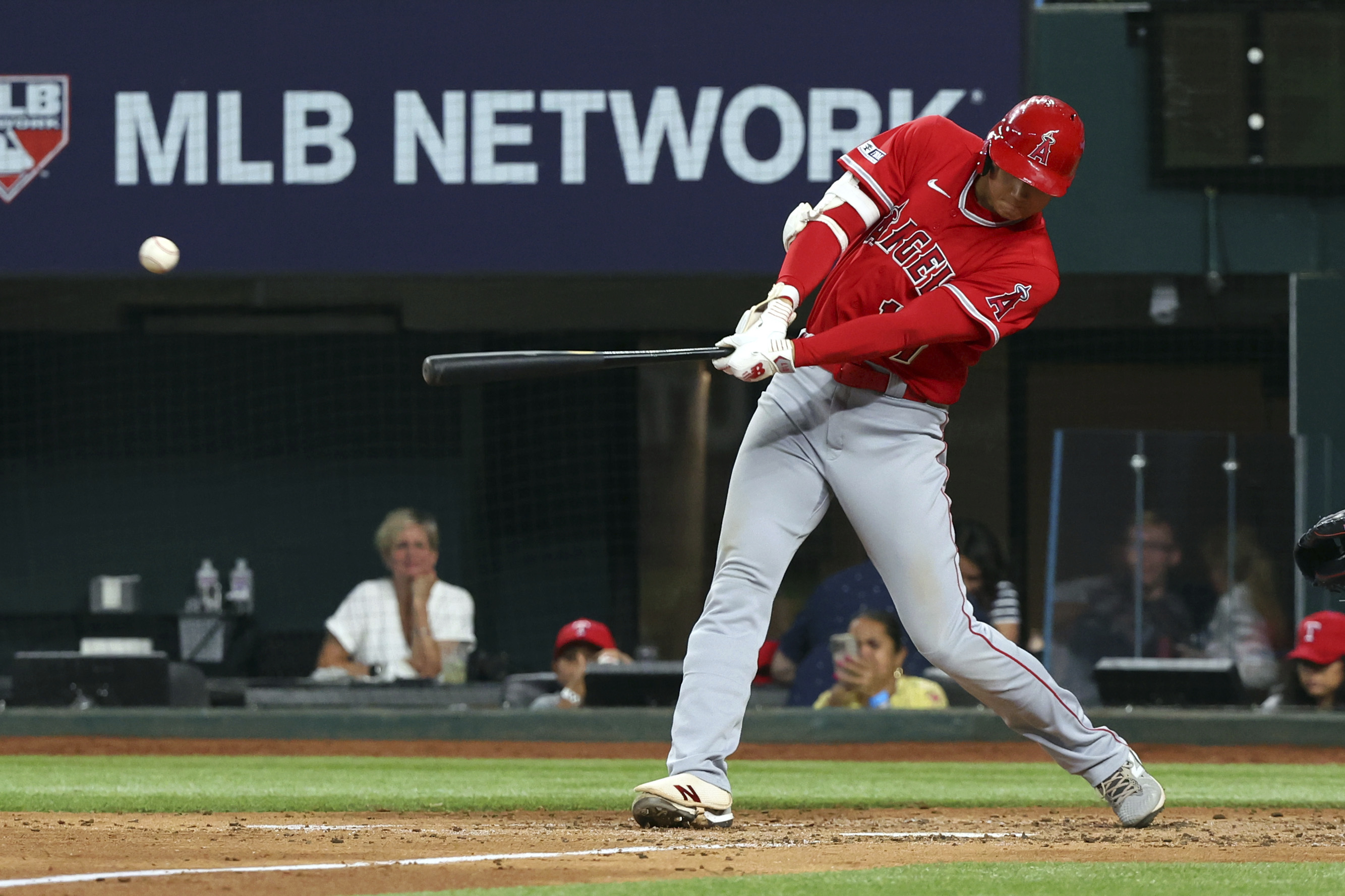 Texas Rangers' Leody Taveras follows through on an RBI single during the  fourth inning of the team's baseball game against the Atlanta Braves,  Wednesday, May 17, 2023, in Arlington, Texas. (AP Photo/Tony