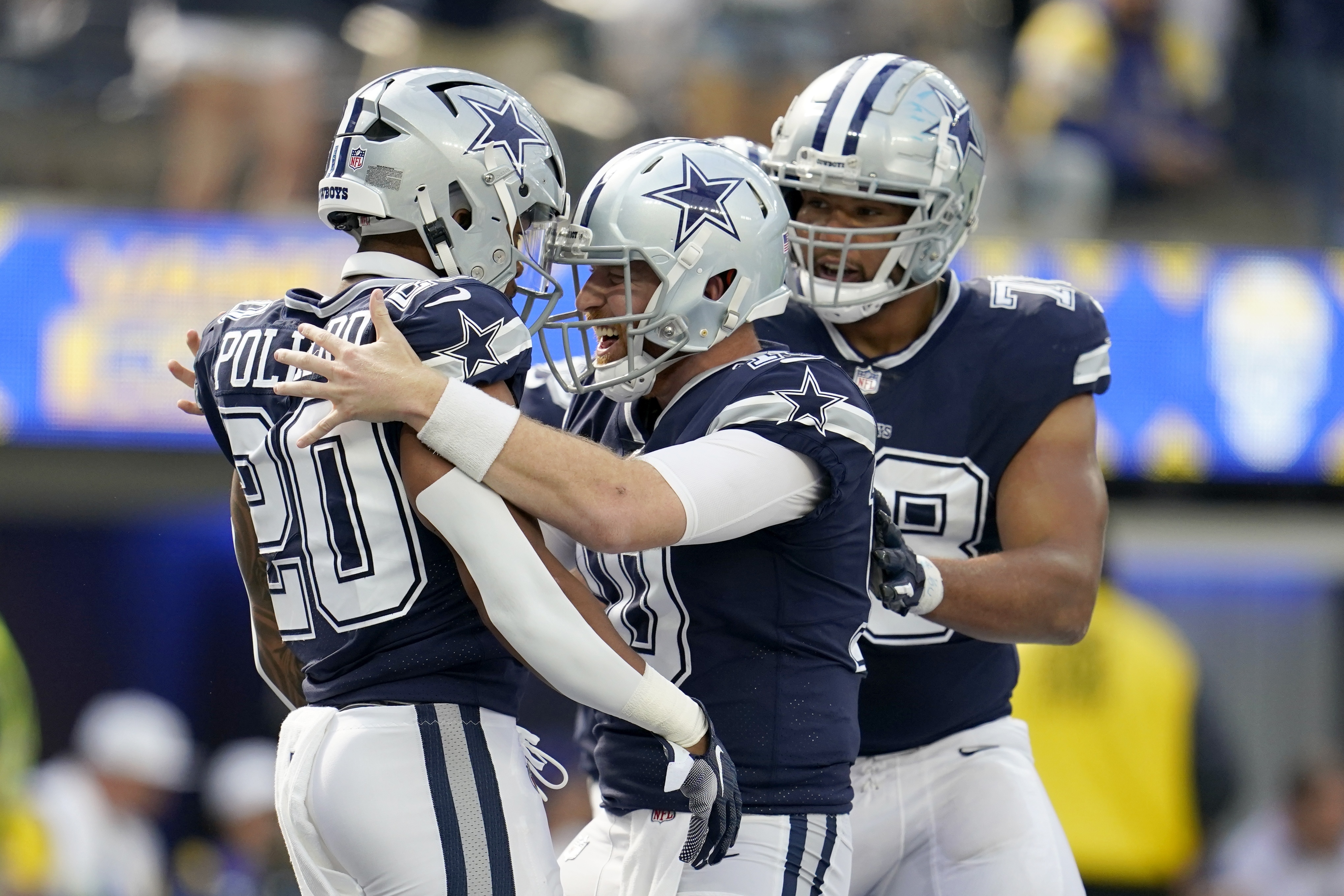 Dominant D puts Cowboys past Rams 22-10 for 4th straight win