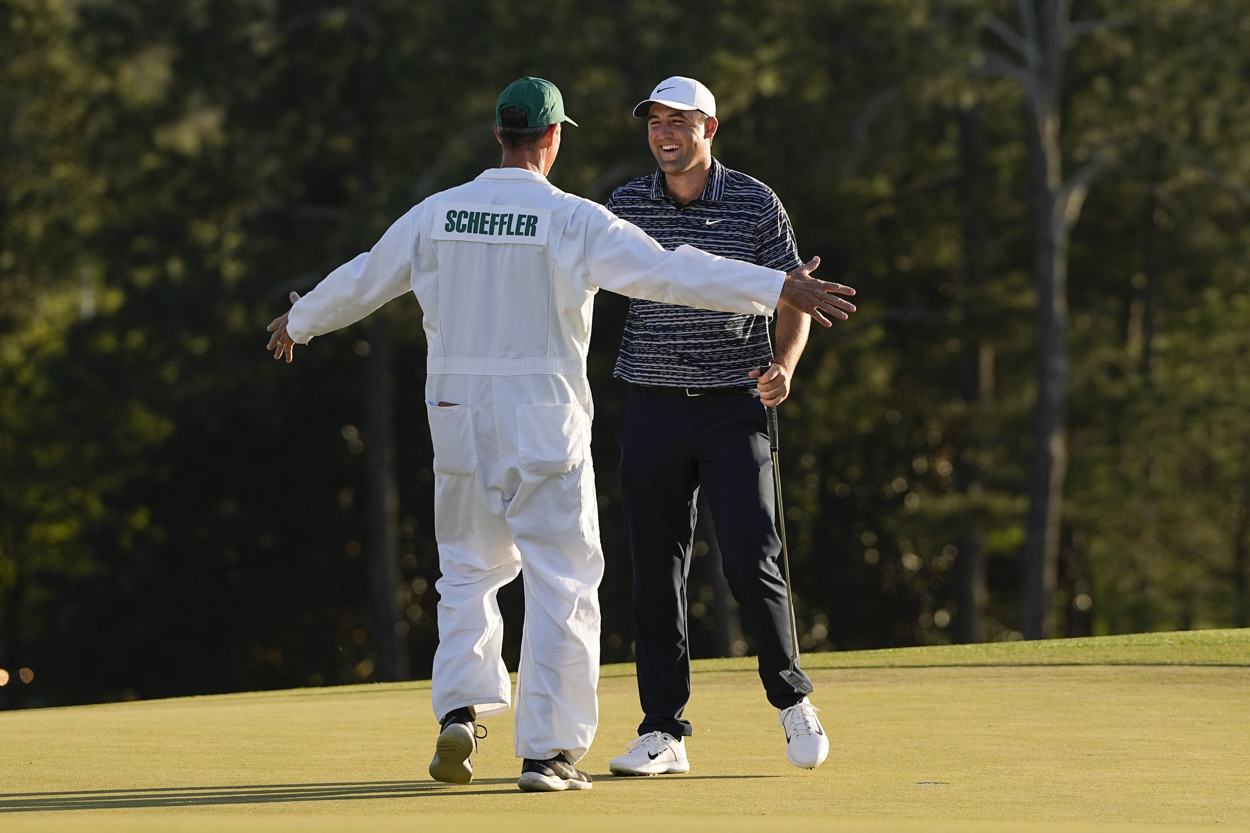 Caddie champ: Ted Scott gets to be part of a 3rd Masters win