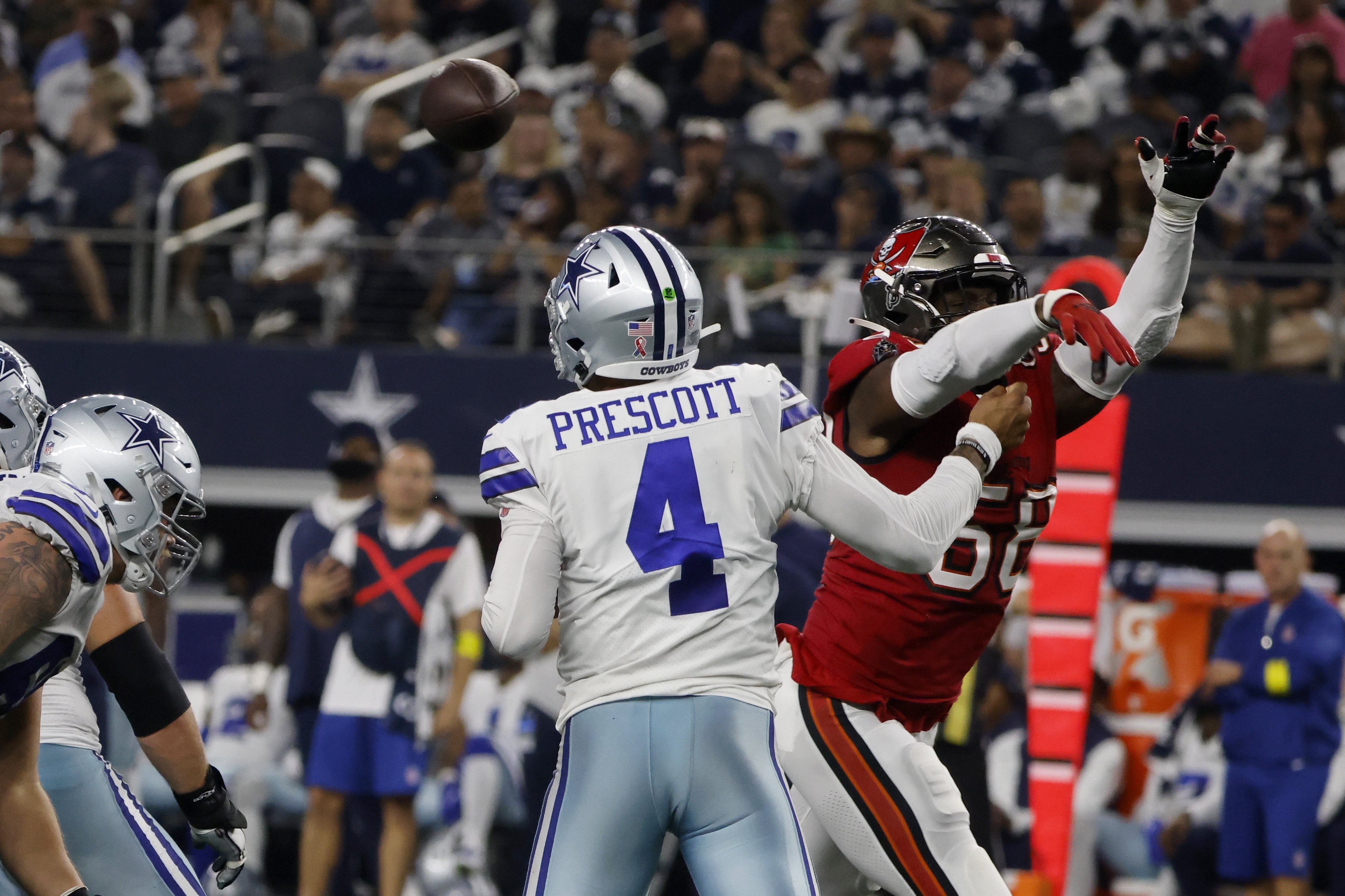 Dallas Cowboys cornerback Anthony Brown (3) defends as Tampa Bay Buccaneers  wide receiver Mike Evans (13) catches a pass in the second half of a NFL  football game in Arlington, Texas, Sunday