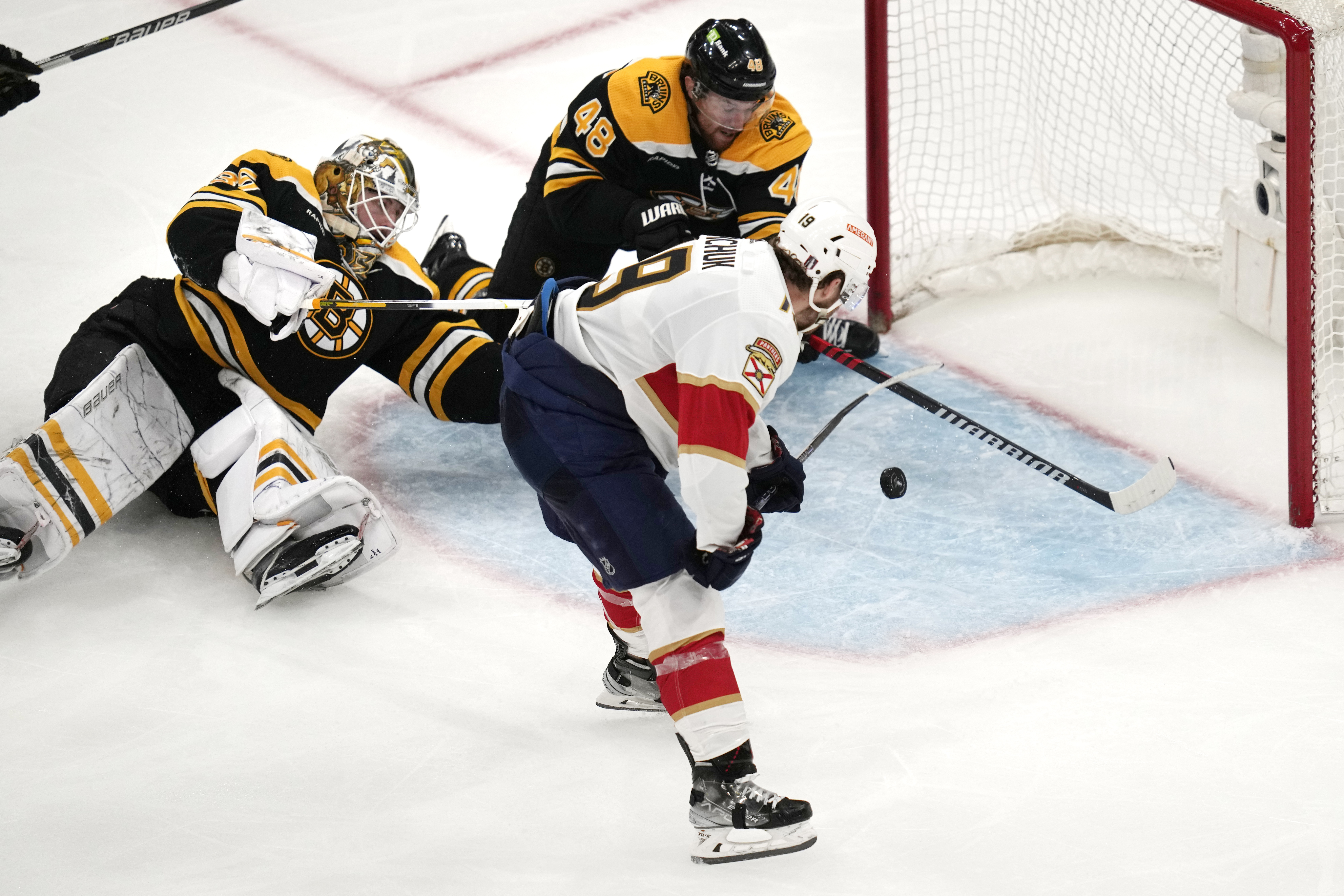 Panthers oust record-setting Bruins 4-3 in OT in Game 7