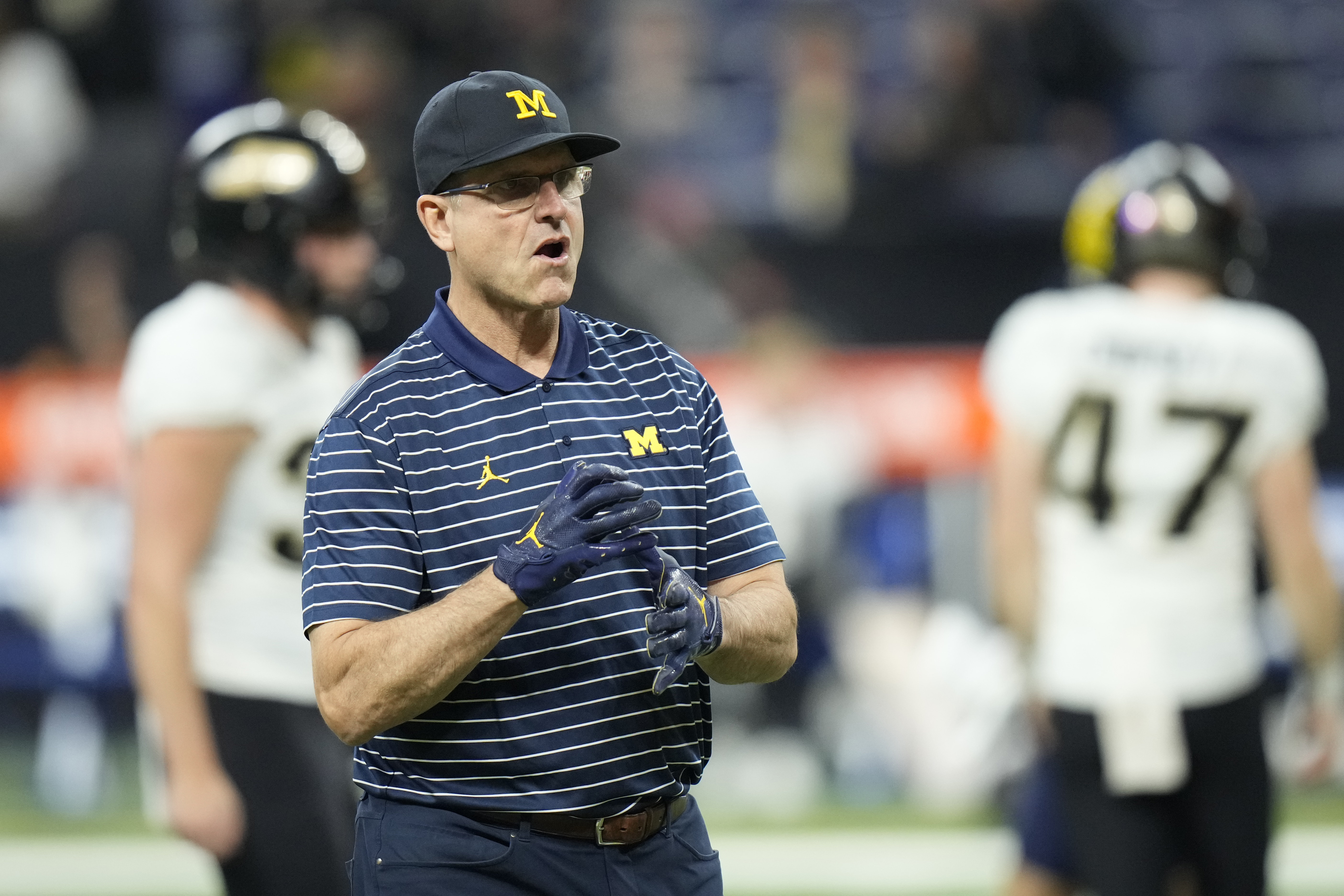 Michigan's Jim Harbaugh reportedly facing 4-game suspension to