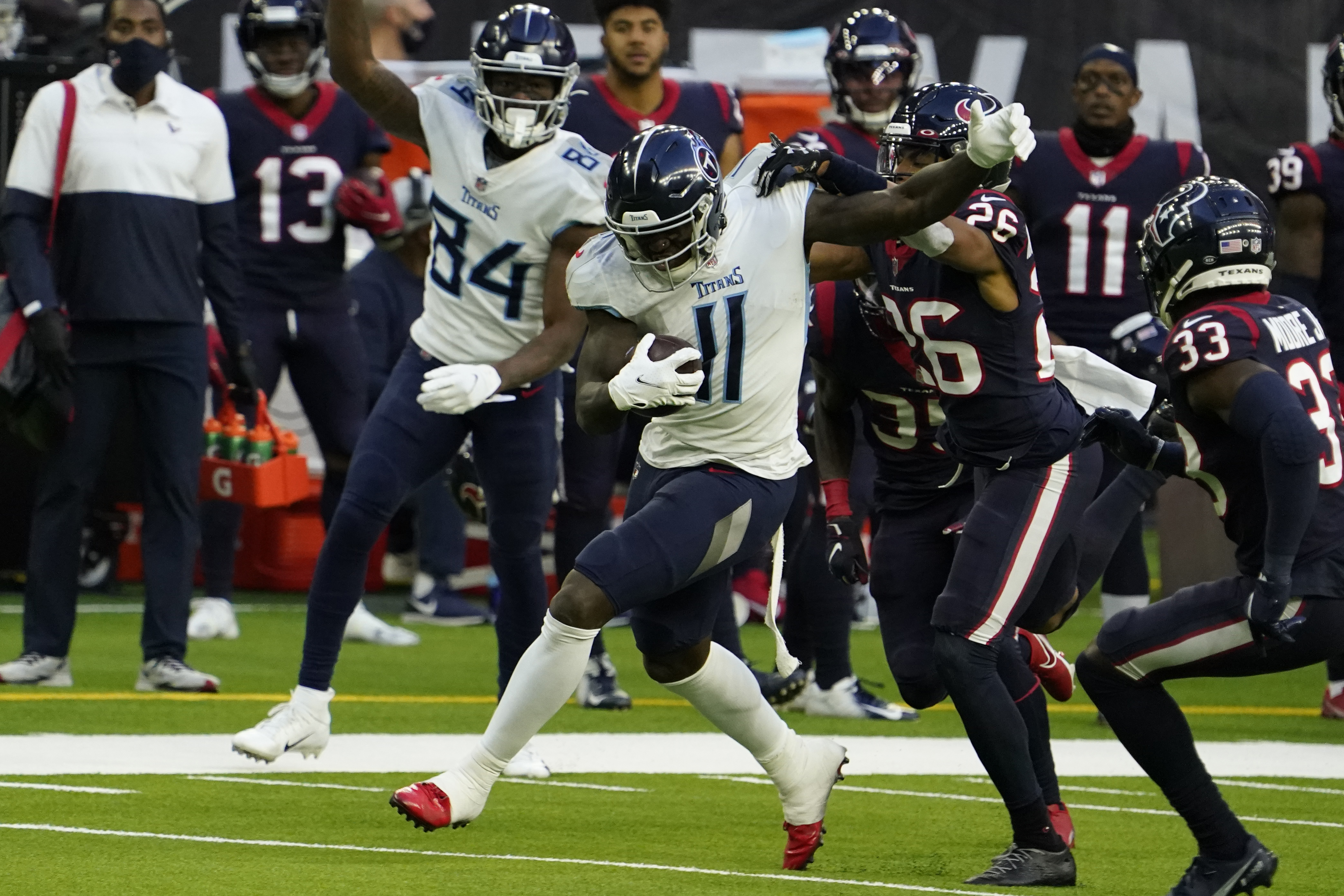 Henry passes 2K, Titans beat Texans 41-38 on late field goal –